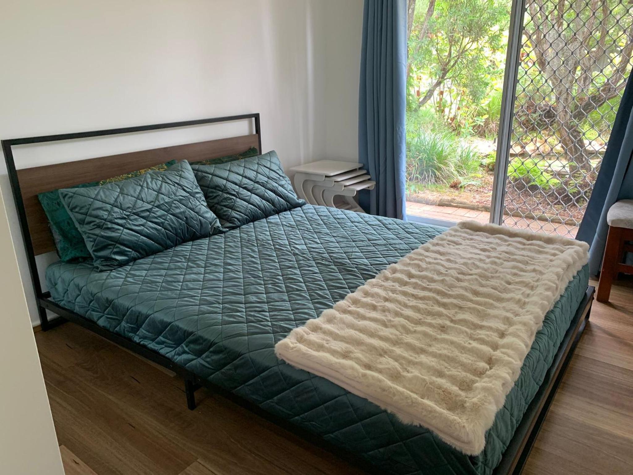 Fabulous Stunning Garden View King Bedroom with shared bathroom at MC 2079