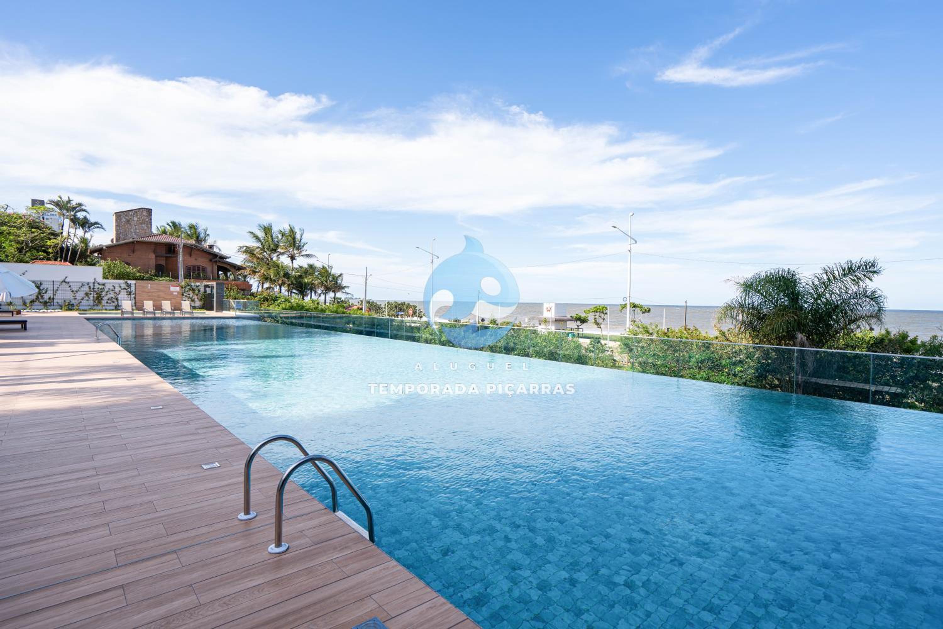Apto 3 Quartos Condomínio Resort Completo Pé na areia com Piscina borda Infinita, Beach Tennis, Academia, Sala de Jogos, Brinquedoteca, Playground e Portar