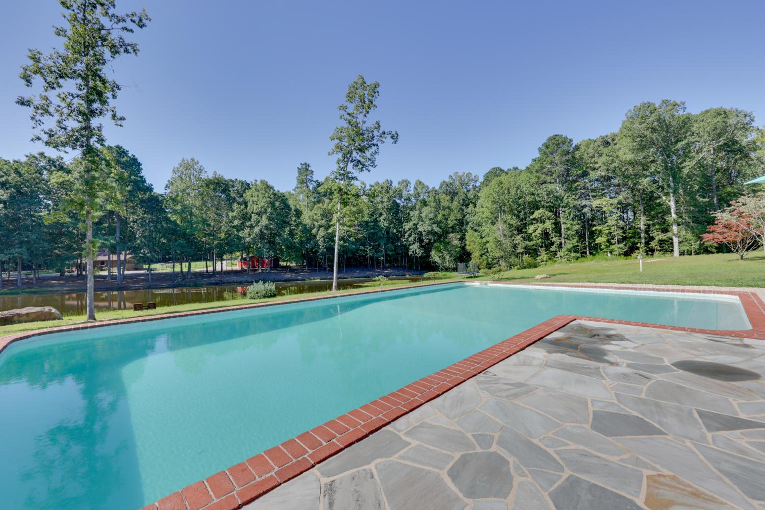 Game Room and Fire Pit! Luxe Louisburg Farmhouse