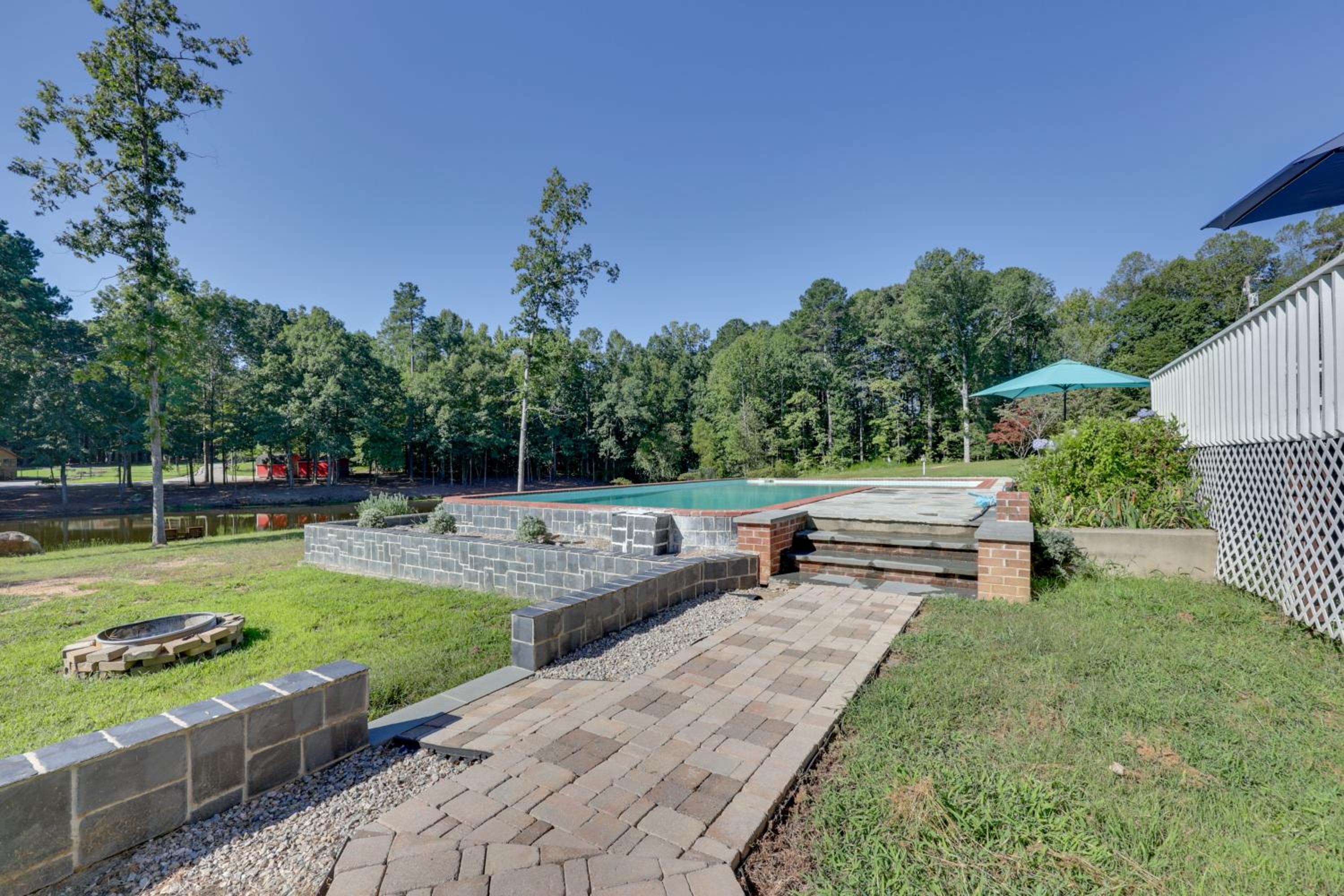 Game Room and Fire Pit! Luxe Louisburg Farmhouse
