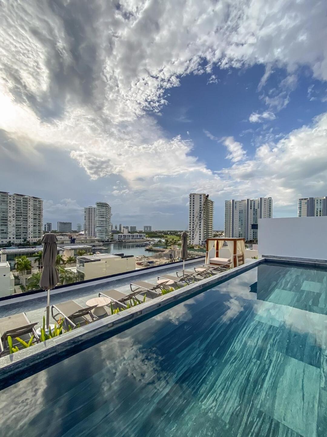 Luxury Retreat in Puerto Cancun with Rooftop Pool