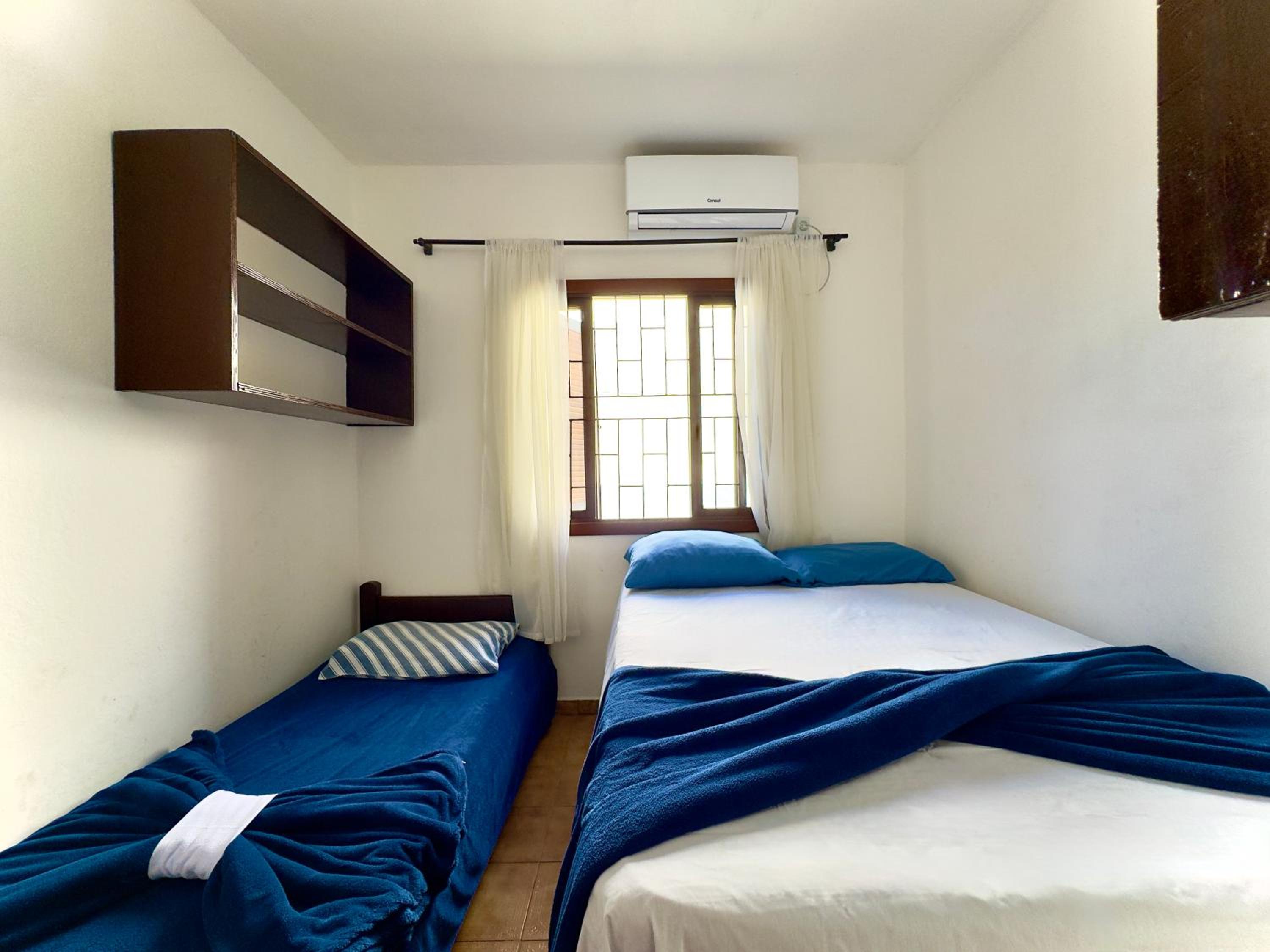 Casa Completa em Penha a poucos passos da PRAIA com Wi Fi TV e Cozinha Equipada Churrasqueira Privativa Ares condicionados Perfeito para Férias em Família