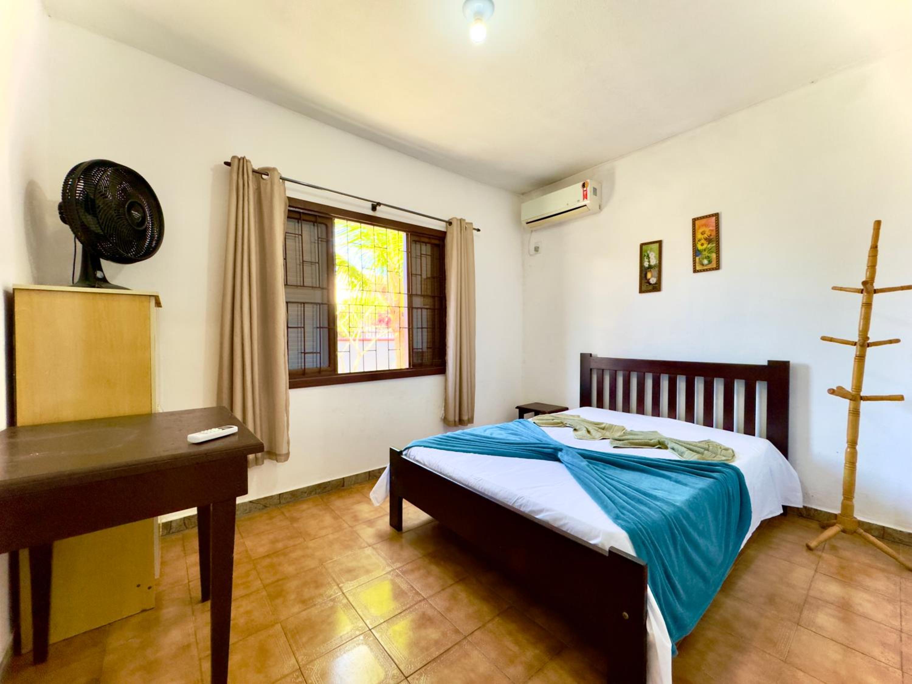 Casa Completa em Penha a poucos passos da PRAIA com Wi Fi TV e Cozinha Equipada Churrasqueira Privativa Ares condicionados Perfeito para Férias em Família