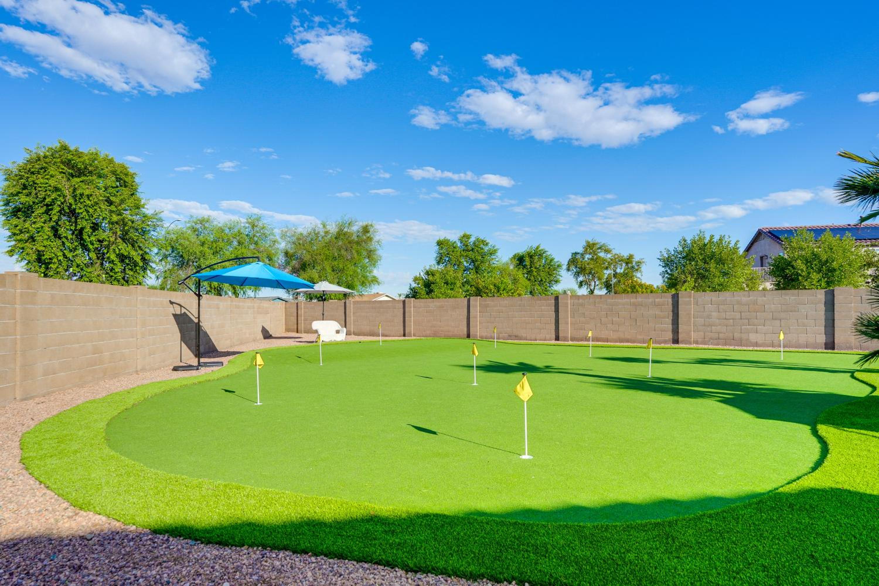 Spacious Backyard with Putting Green Peoria Retreat