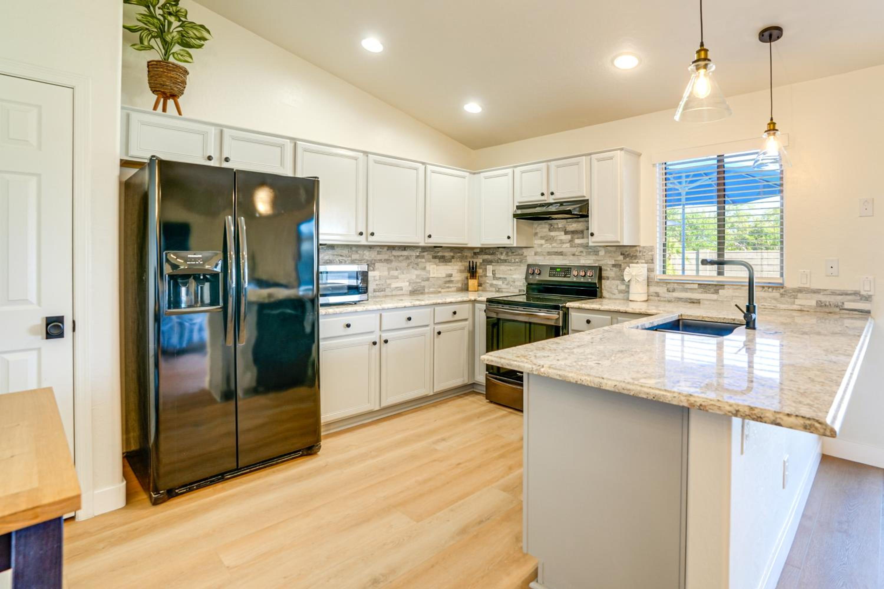 Spacious Backyard with Putting Green Peoria Retreat