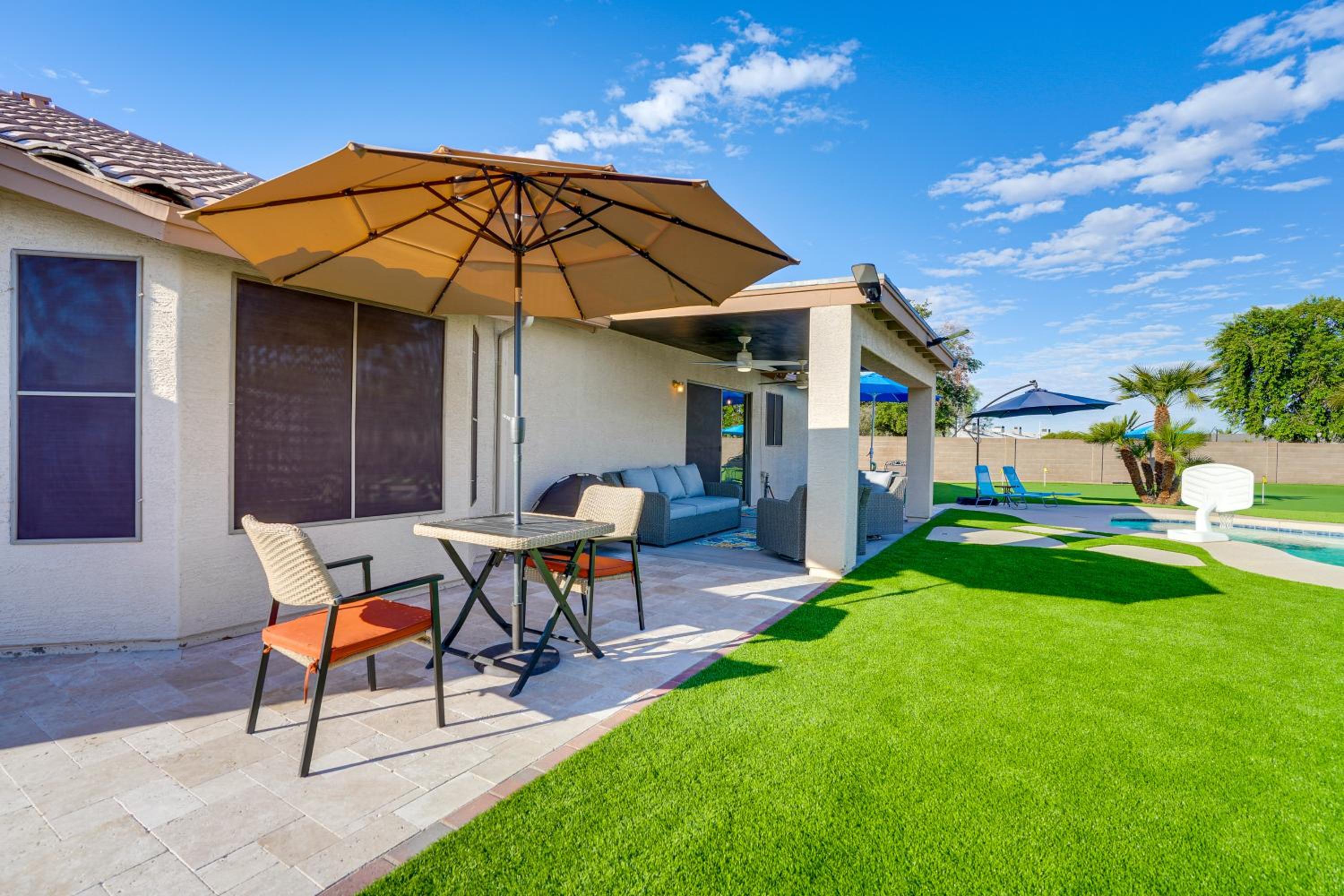 Spacious Backyard with Putting Green Peoria Retreat