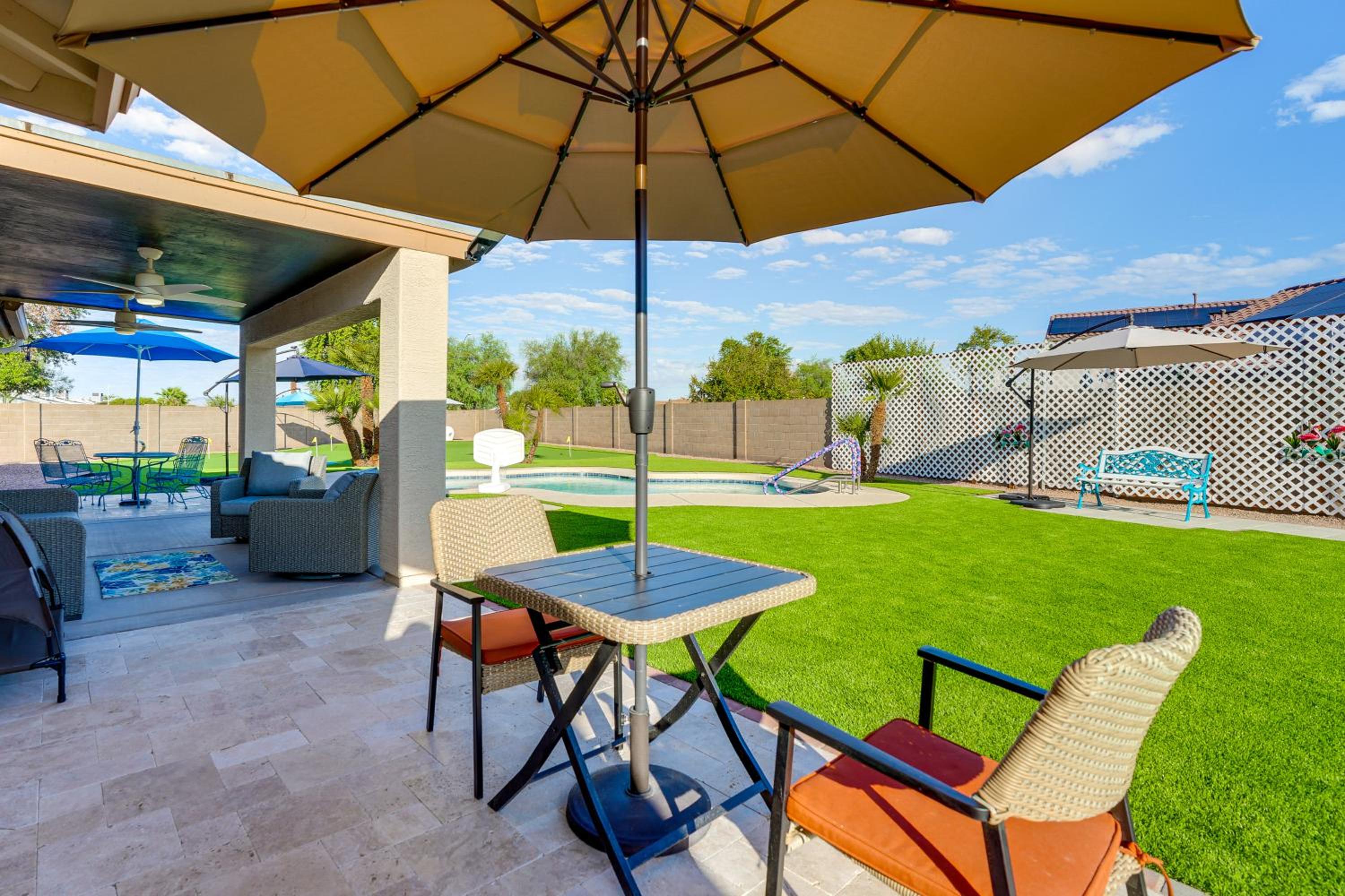 Spacious Backyard with Putting Green Peoria Retreat