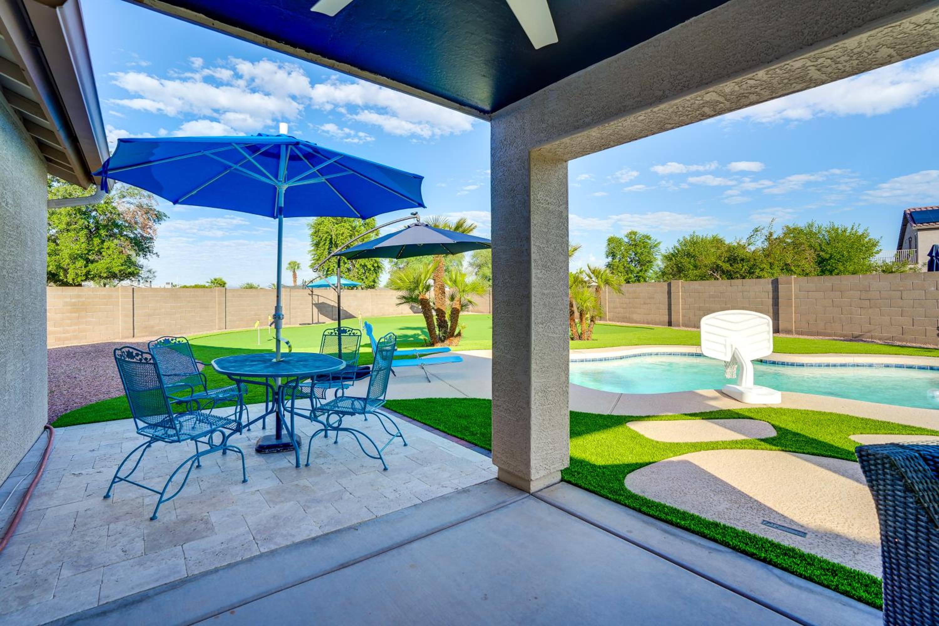 Spacious Backyard with Putting Green Peoria Retreat