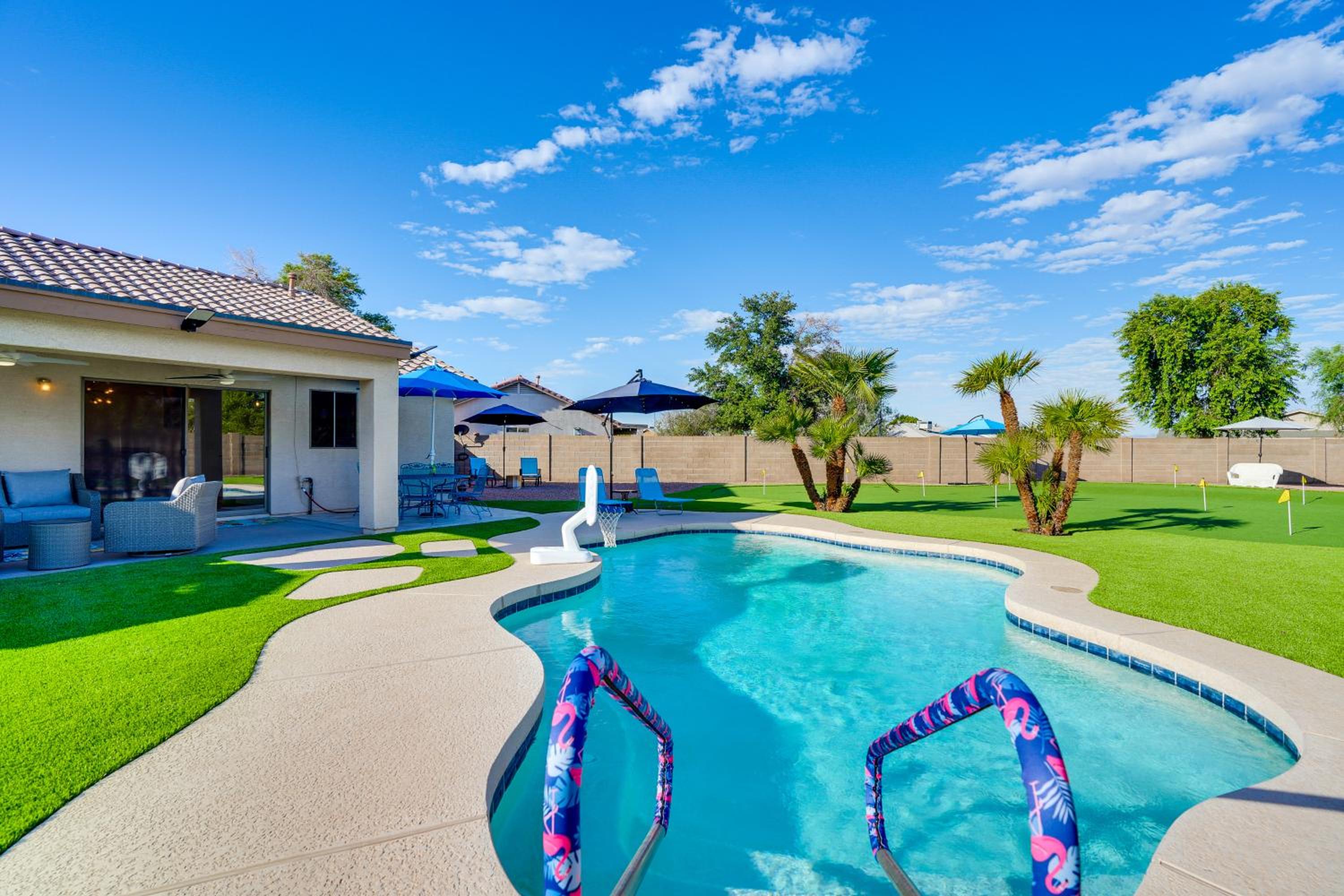 Spacious Backyard with Putting Green Peoria Retreat