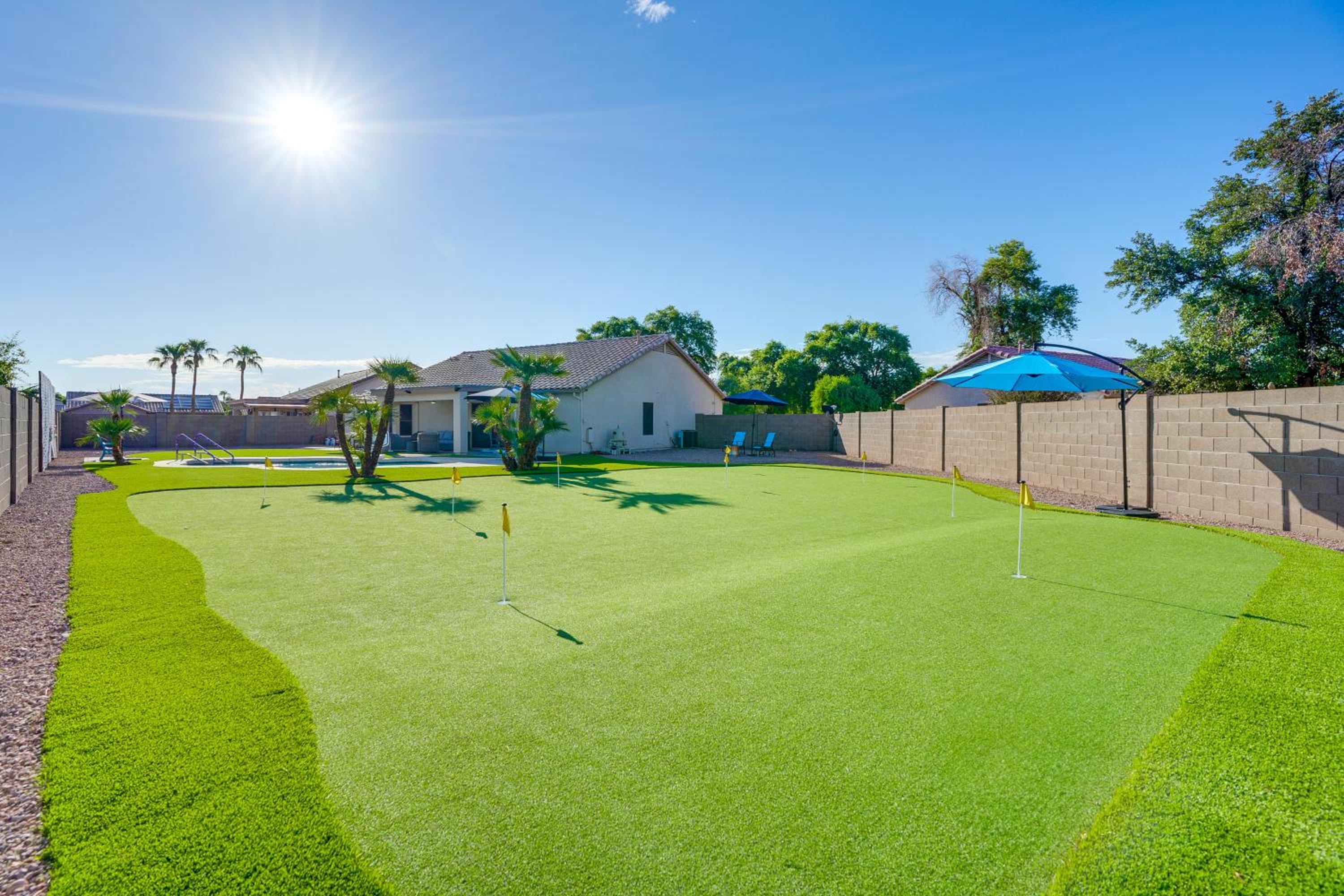 Spacious Backyard with Putting Green Peoria Retreat