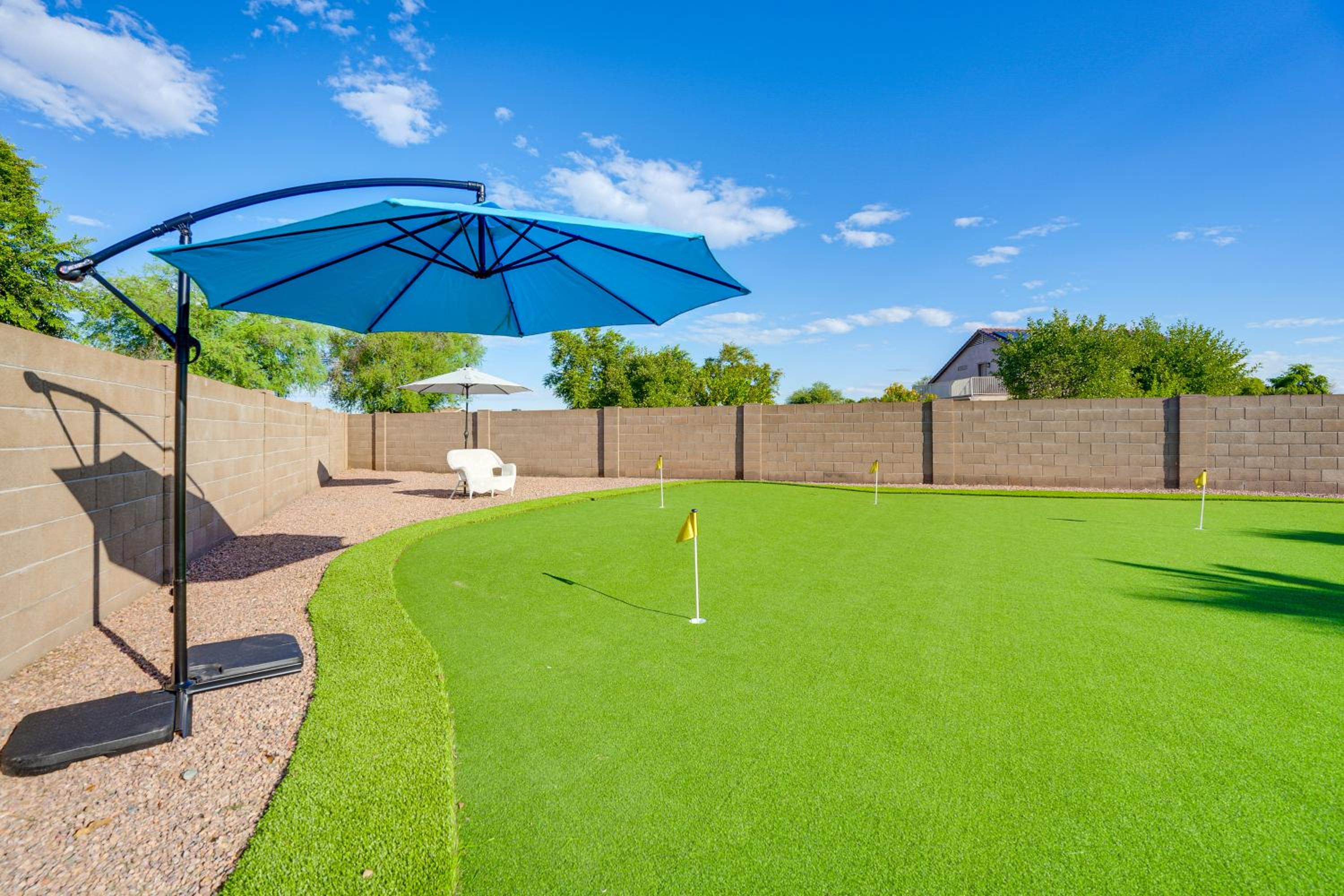 Spacious Backyard with Putting Green Peoria Retreat