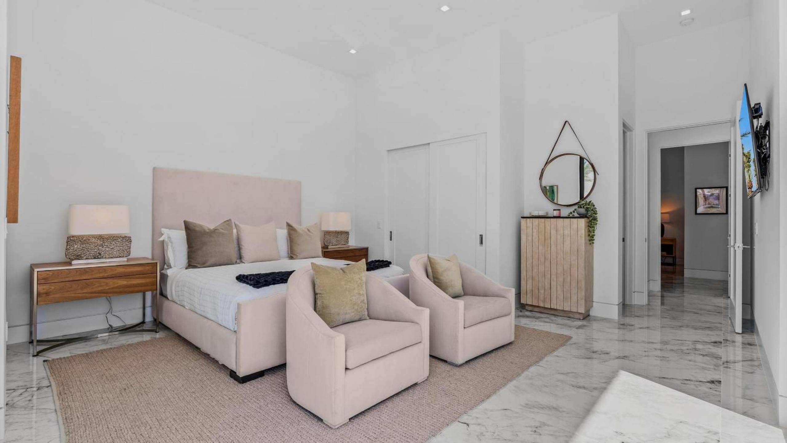 Sleeps 25 2 Luxury Villas w Pool Spa Putting Green Bravo by AvantStay