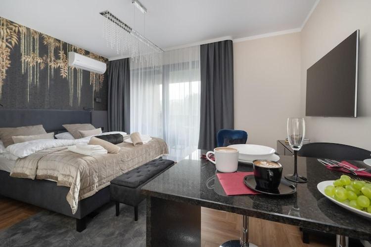Holiday studio with balcony, indoor pool, sauna