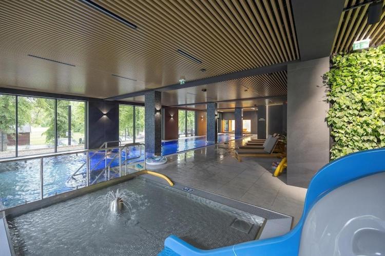 Holiday studio with balcony, indoor pool, sauna