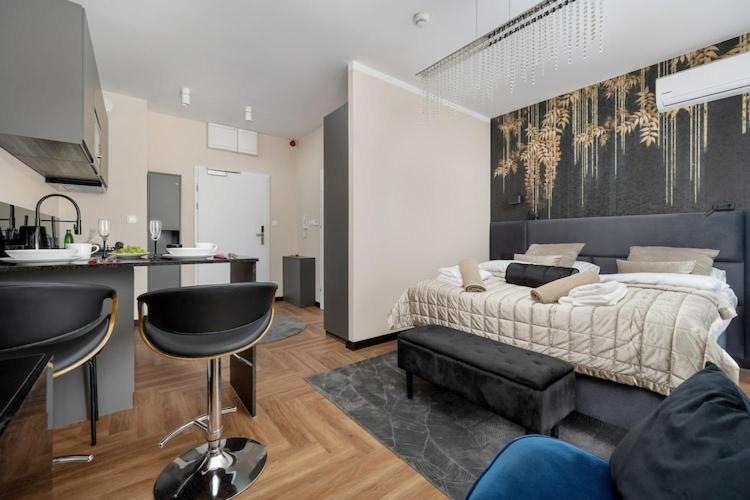 Holiday studio with balcony, indoor pool, sauna