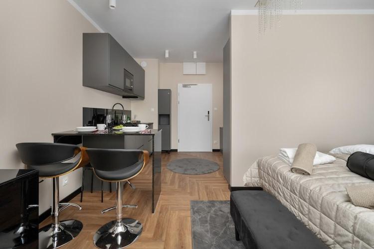 Holiday studio with balcony, indoor pool, sauna