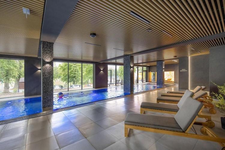 Holiday studio with balcony, indoor pool, sauna
