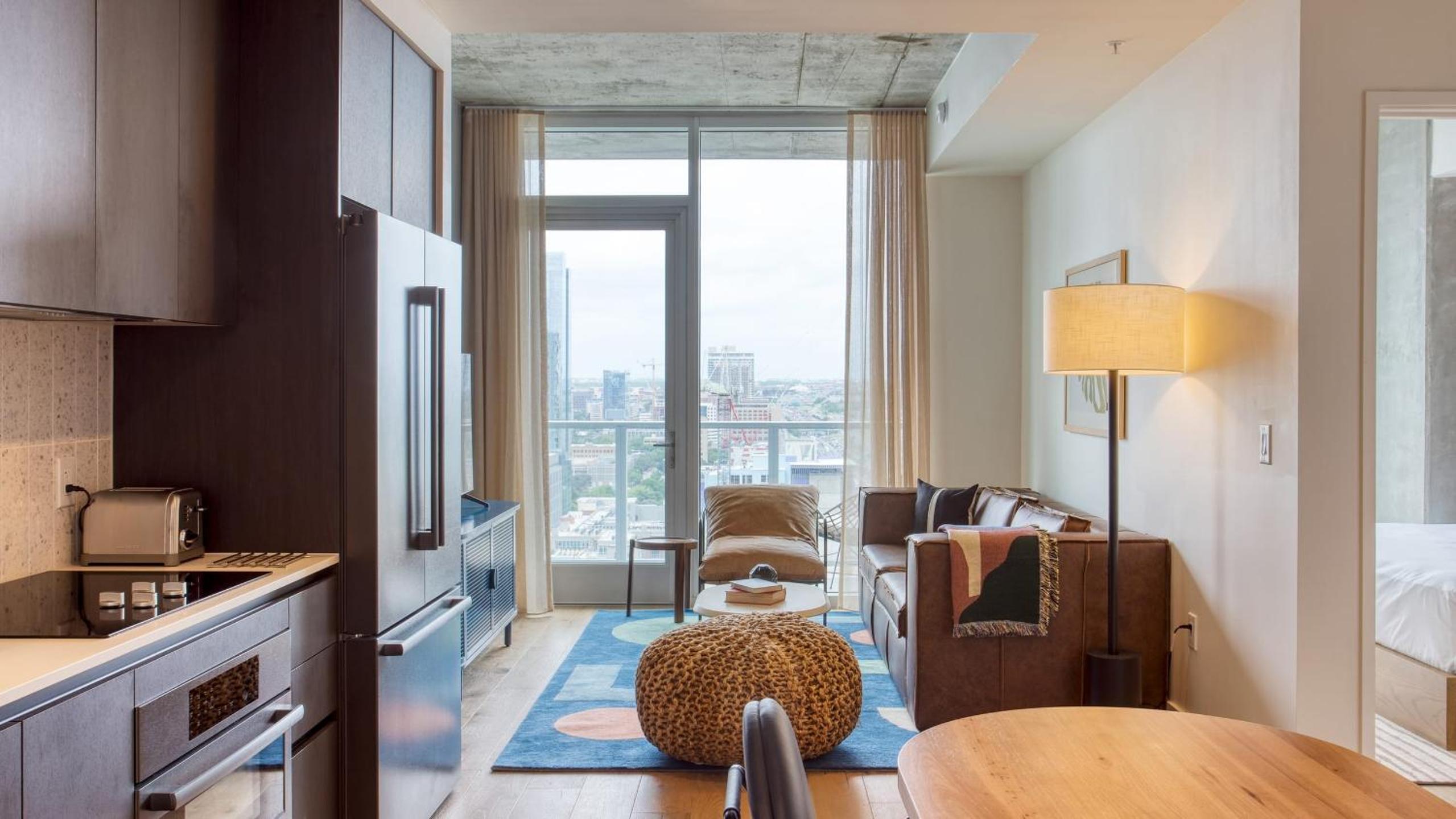 Sleeps 34 11 Condos in New Austin High Rise w Rooftop Pool Gym Yoga Studio