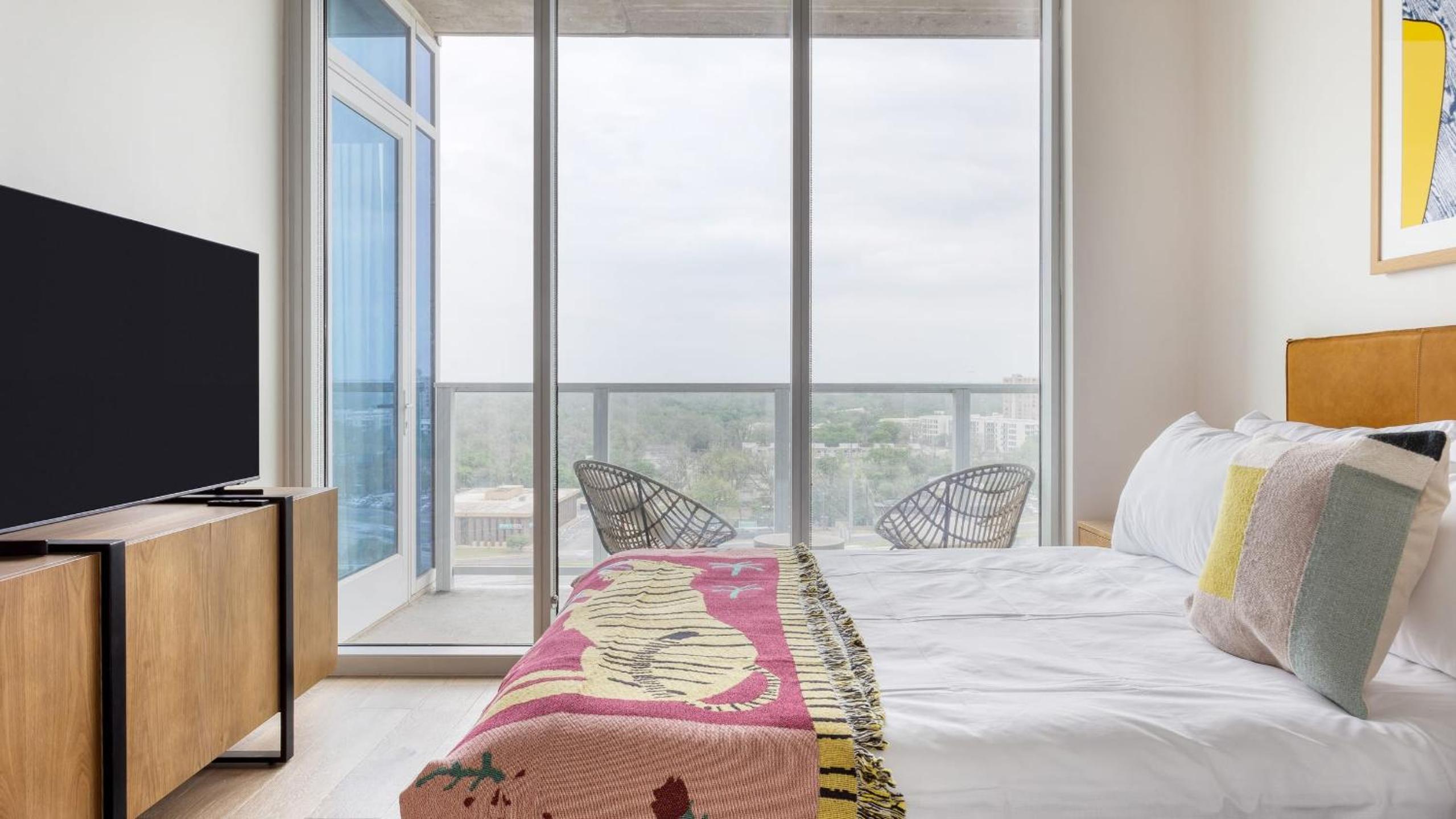 Sleeps 34 11 Condos in New Austin High Rise w Rooftop Pool Gym Yoga Studio