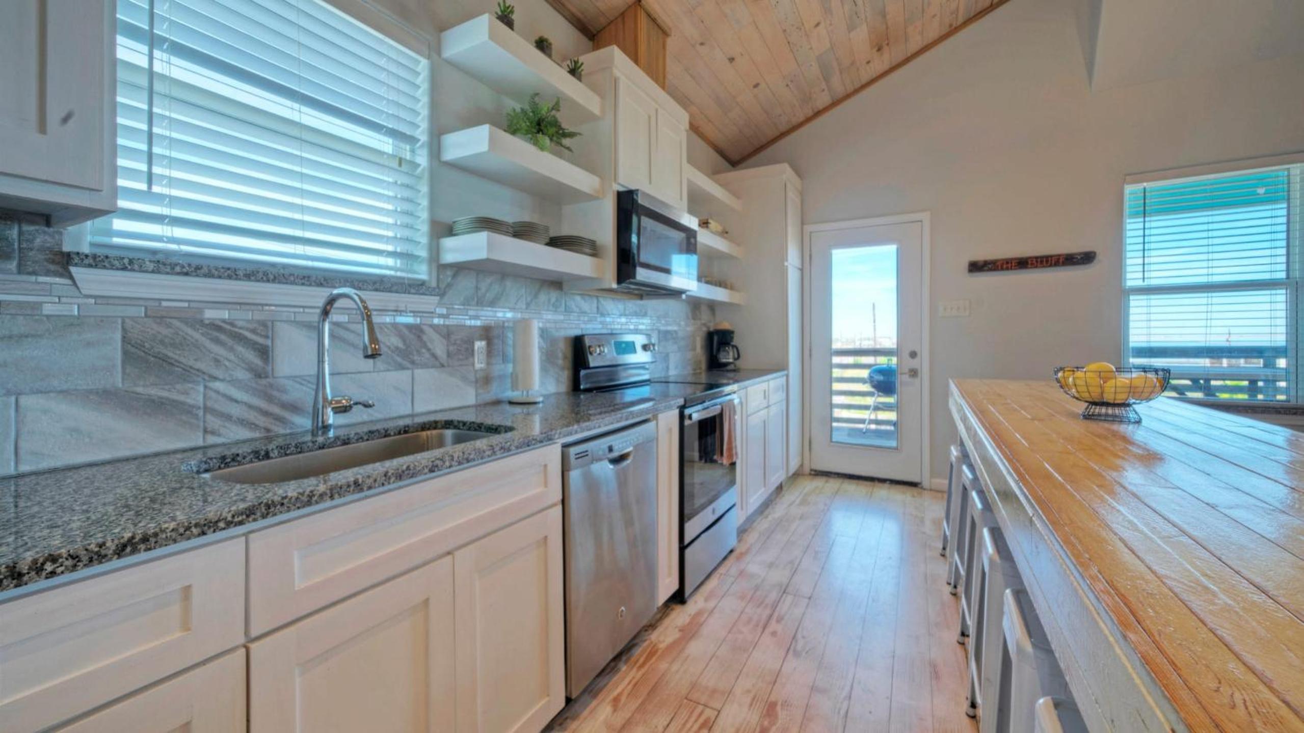 Sleeps 31 2 Homes w Boat Dock Waterfront Pool Laguna Village Getaway