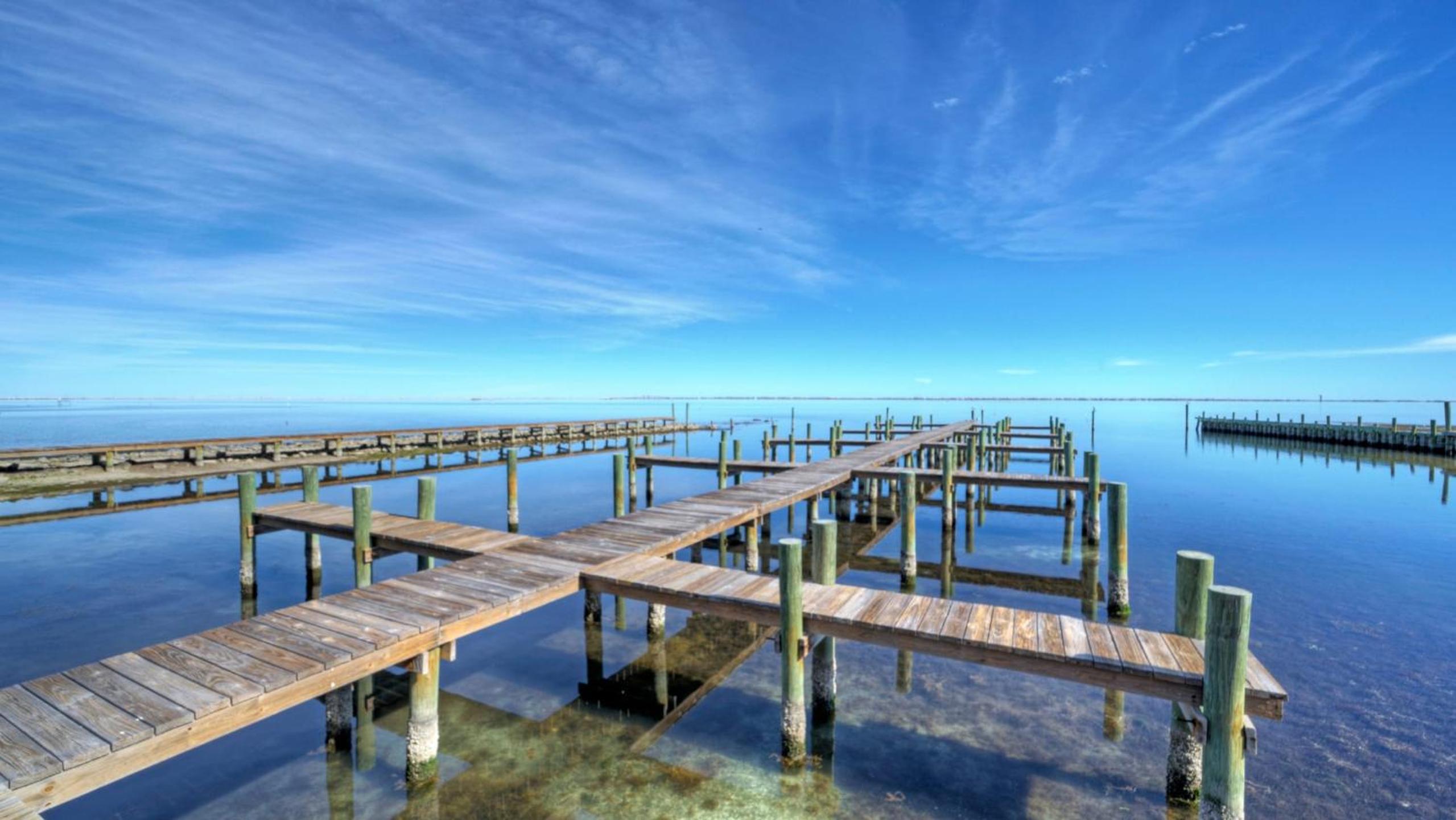 Sleeps 31 2 Homes w Boat Dock Waterfront Pool Laguna Village Getaway
