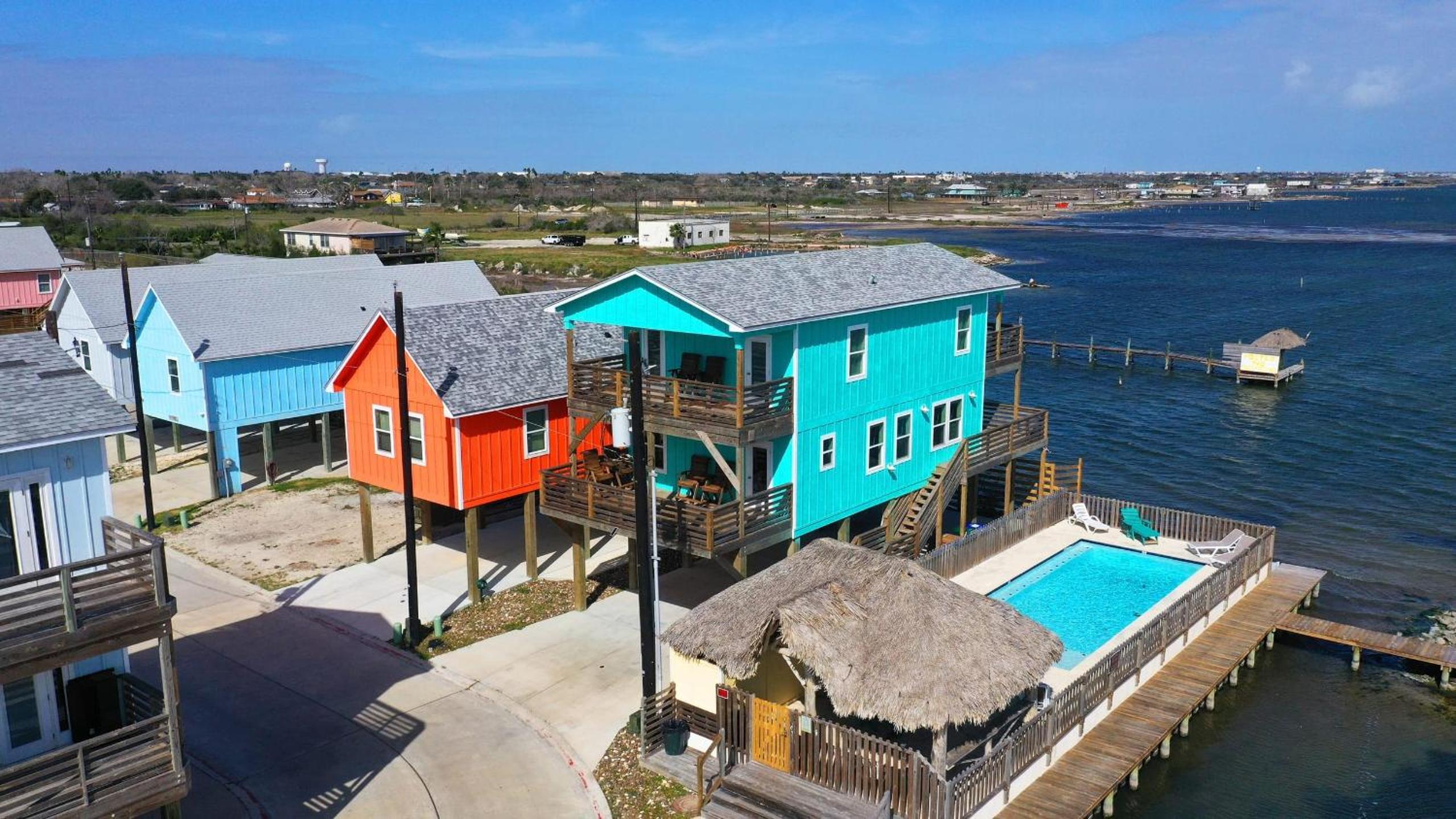 Sleeps 31 2 Homes w Boat Dock Waterfront Pool Laguna Village Getaway