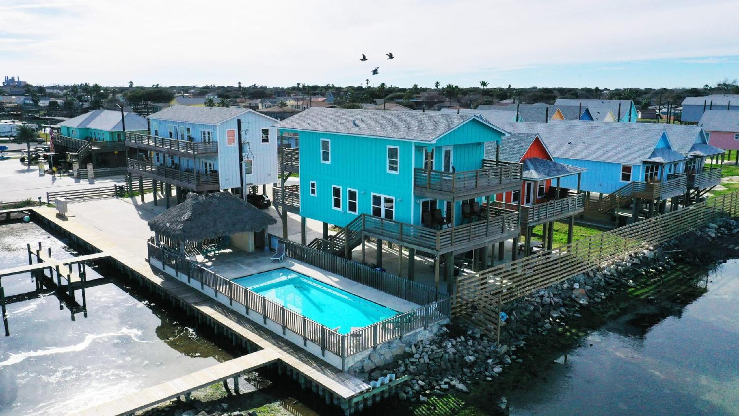 Sleeps 31 2 Homes w Boat Dock Waterfront Pool Laguna Village Getaway
