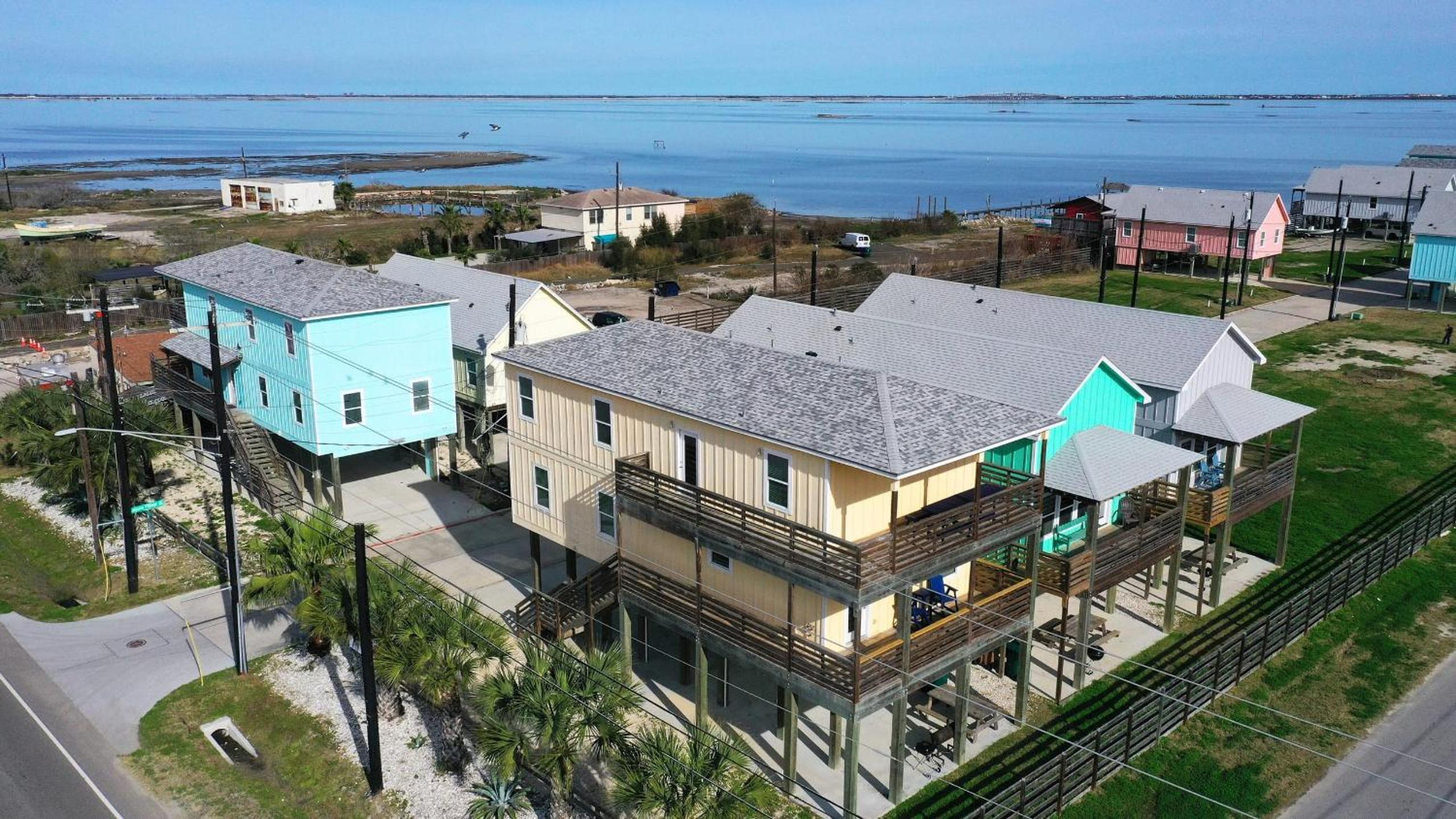 Sleeps 31 2 Homes w Boat Dock Waterfront Pool Laguna Village Getaway