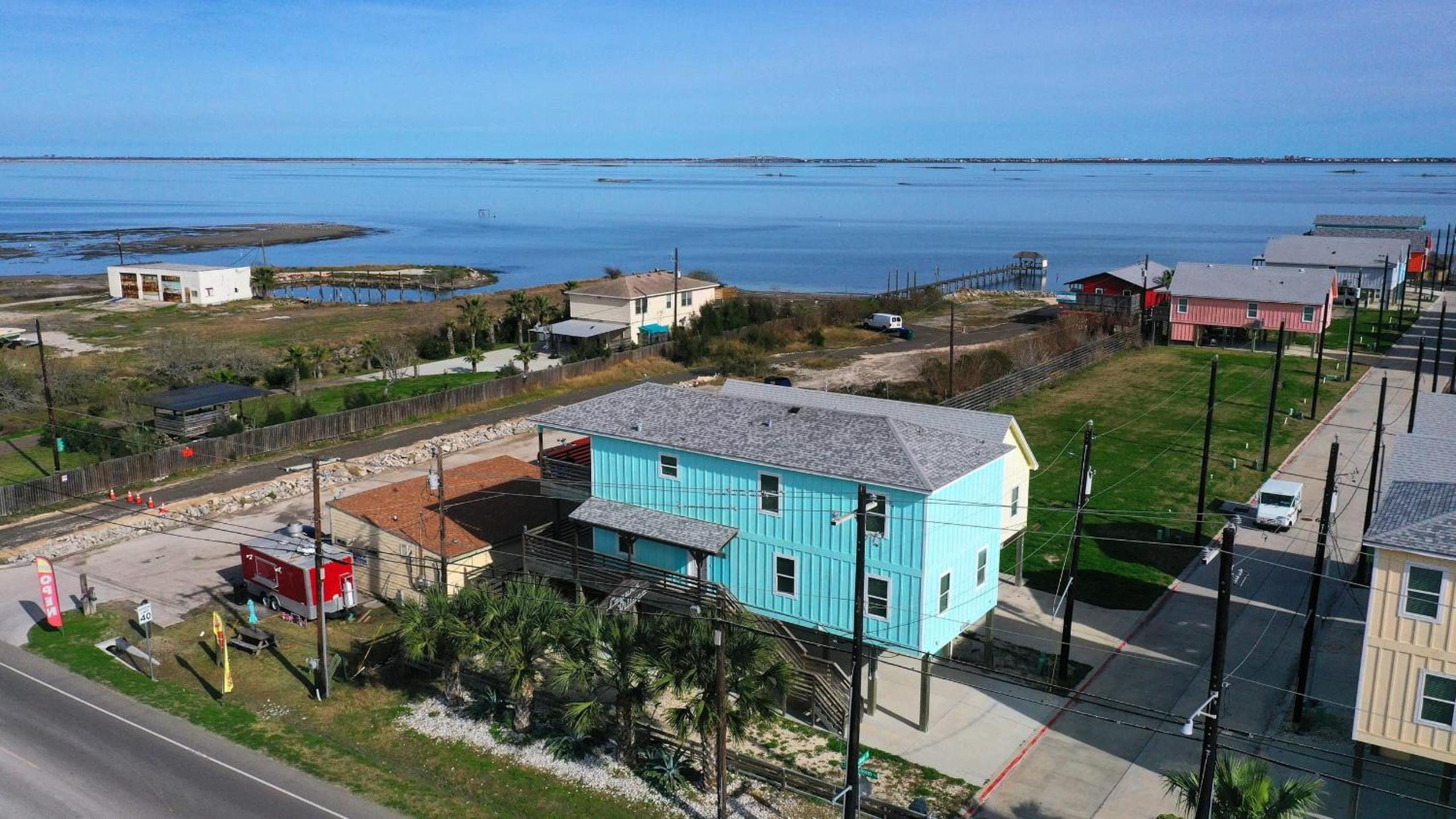 Sleeps 31 2 Homes w Boat Dock Waterfront Pool Laguna Village Getaway