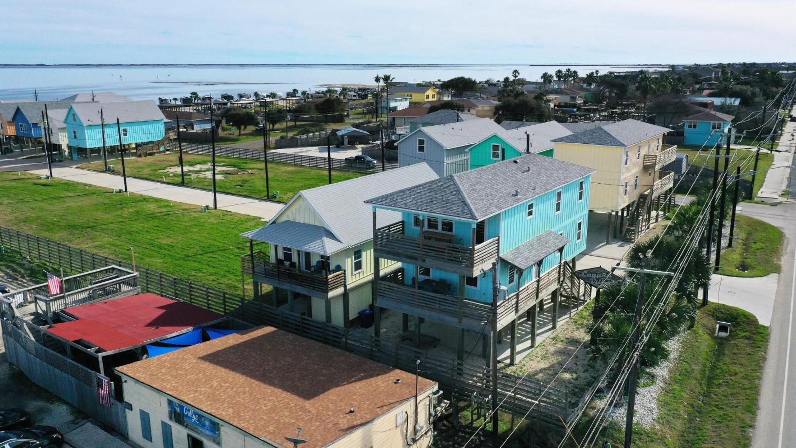 Sleeps 31 2 Homes w Boat Dock Waterfront Pool Laguna Village Getaway