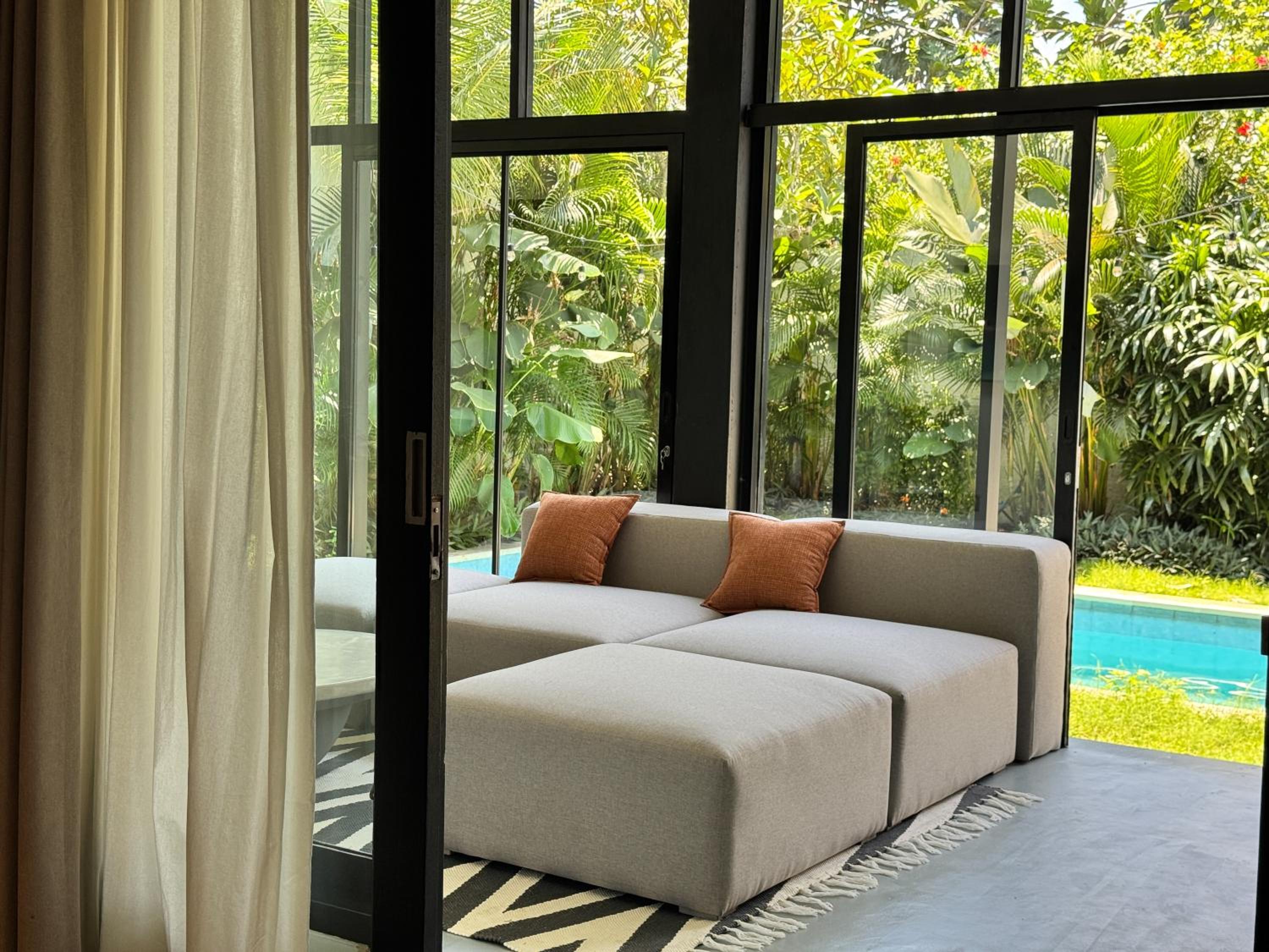 3BR Tropical Villa with Pool & Lush Garden Oasis, 4 minutes to the beach