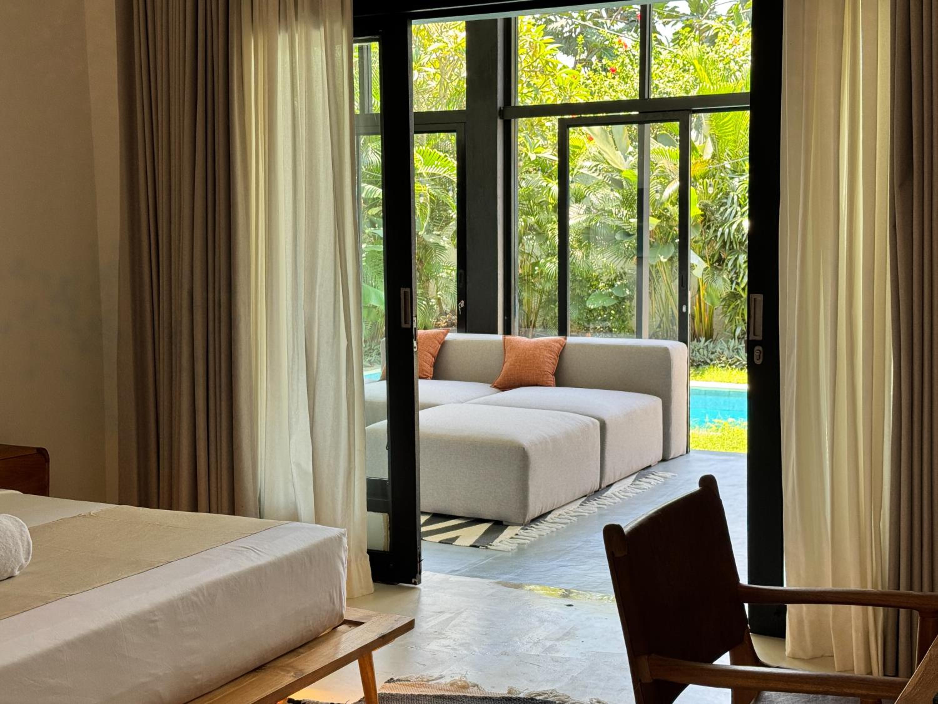 3BR Tropical Villa with Pool & Lush Garden Oasis, 4 minutes to the beach