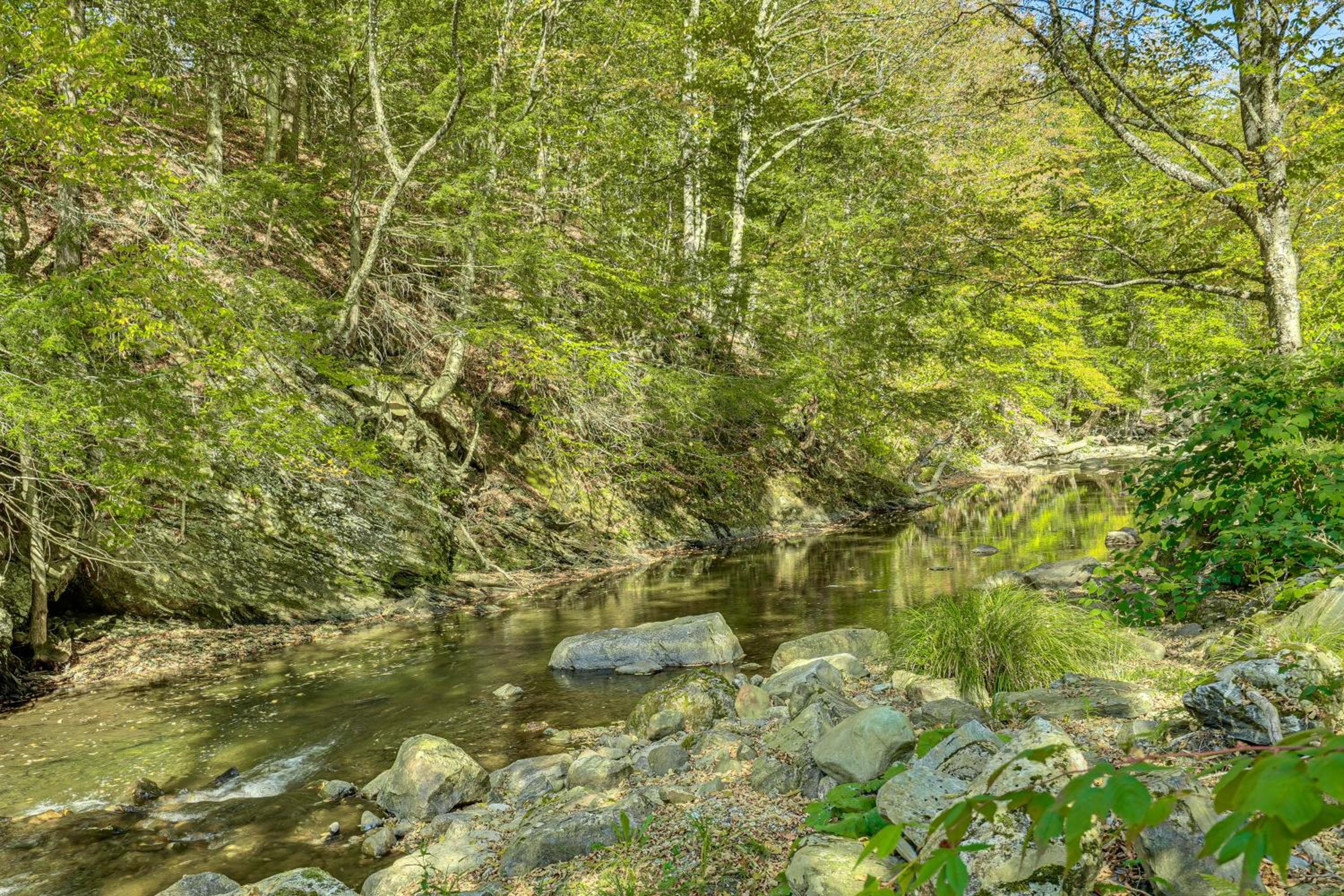 Riverfront Home with Hot Tub Near Killington Resort