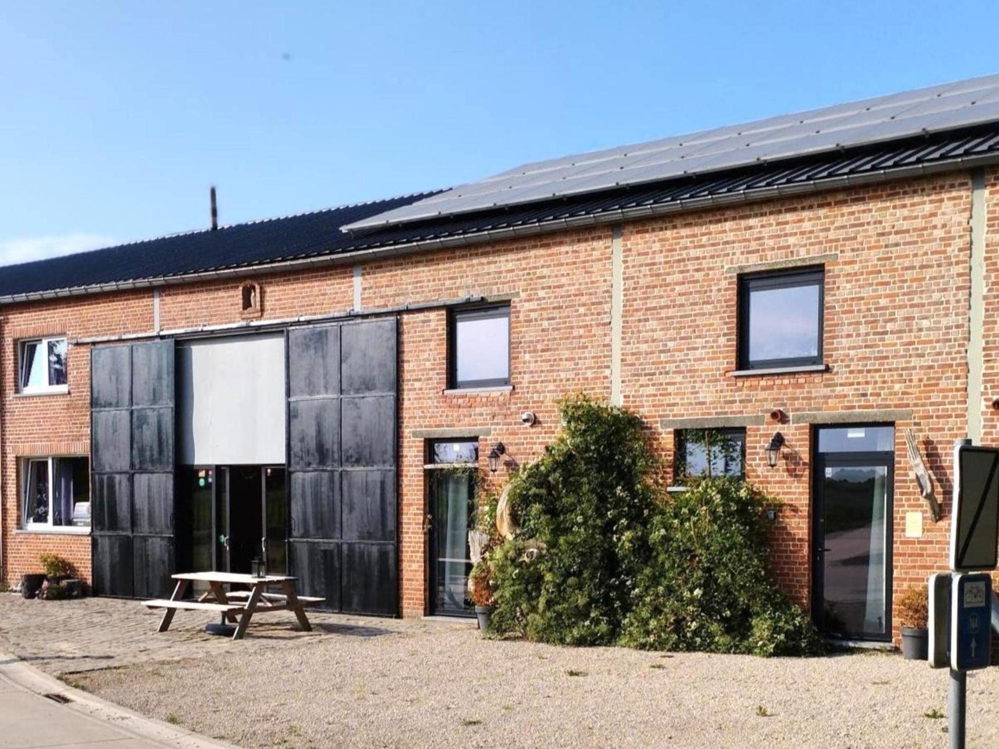 Holiday home with garden and roofed terrace