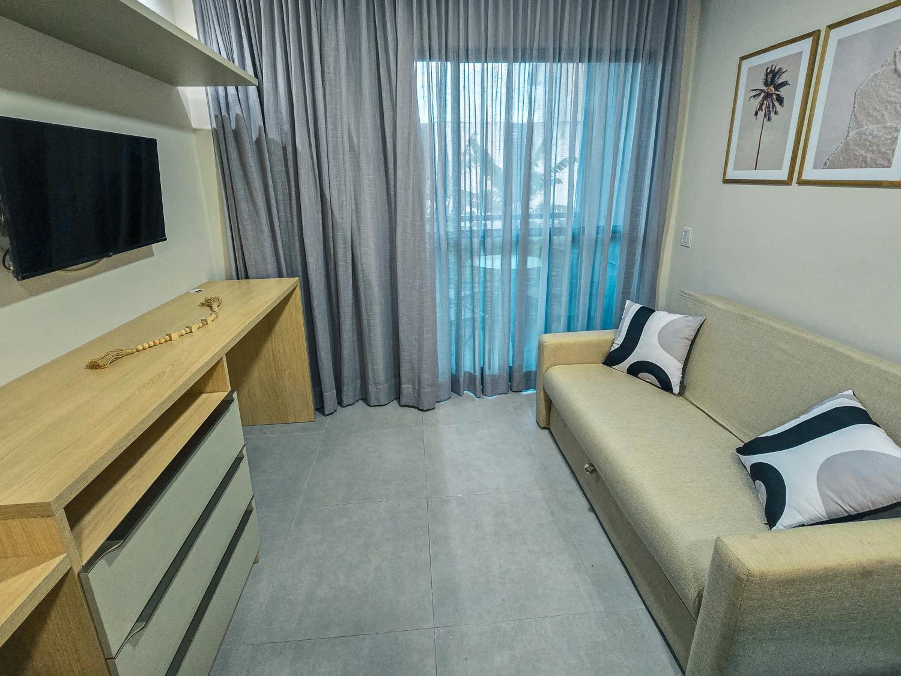 Flat 100m da praia, piscina, churrasqueira e sauna BY Oasis Ferias