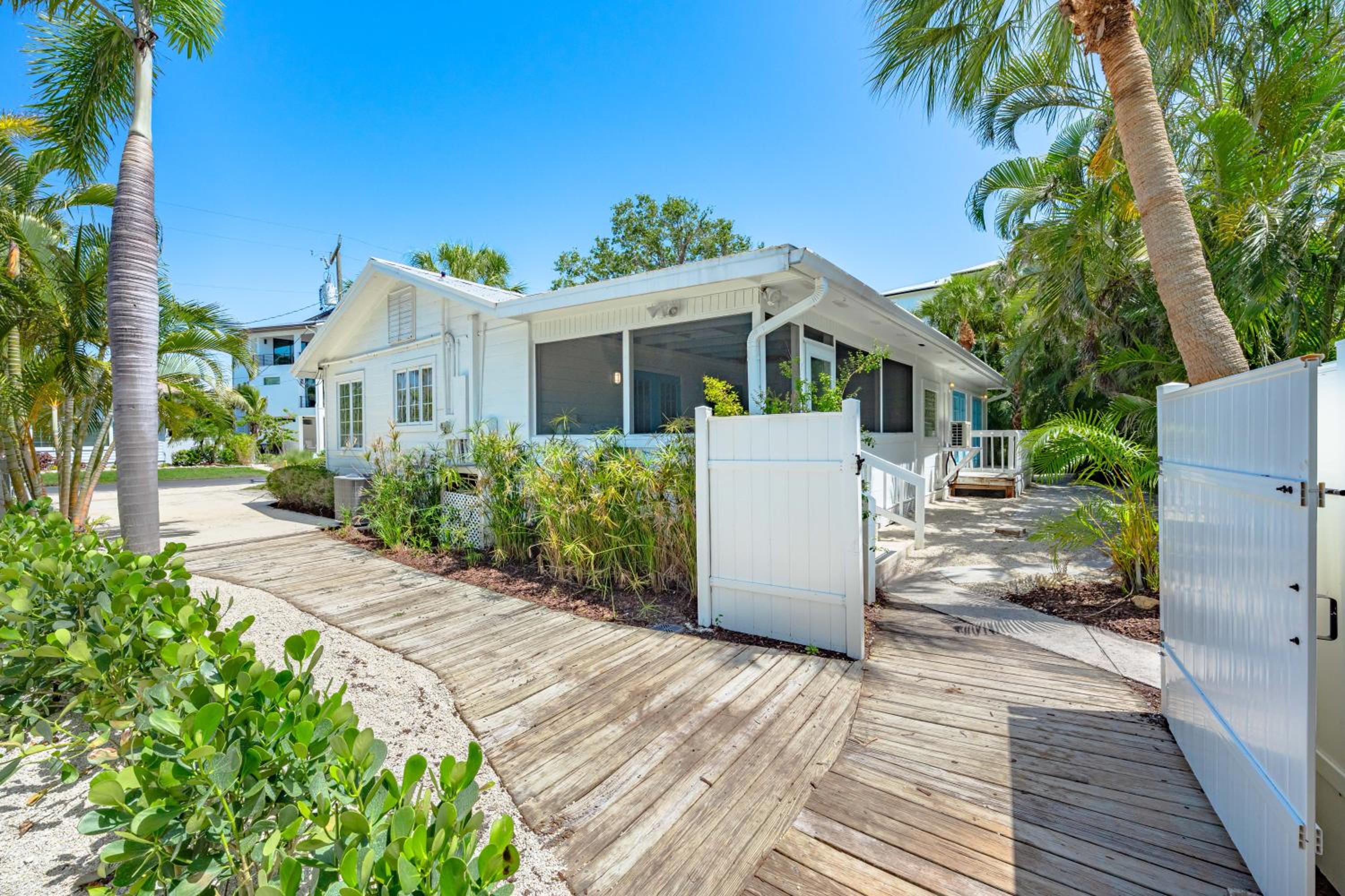A Charming Beach Cottage by Beachside Management