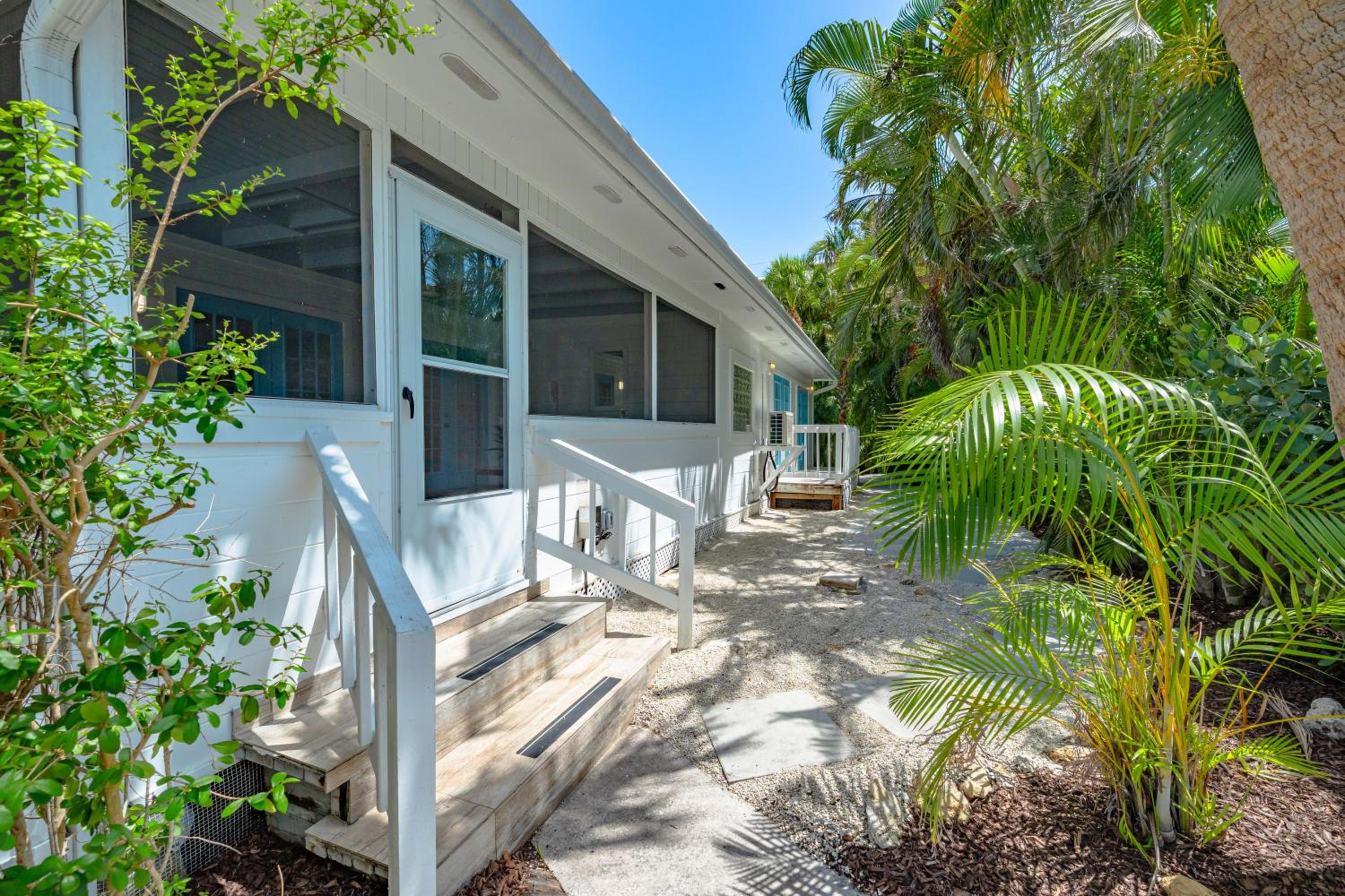 A Charming Beach Cottage by Beachside Management