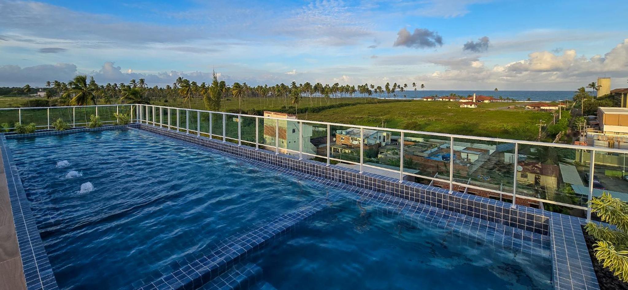 CG101- Flat Rooftop com piscina infinita e garagem- By Oasis Ferias