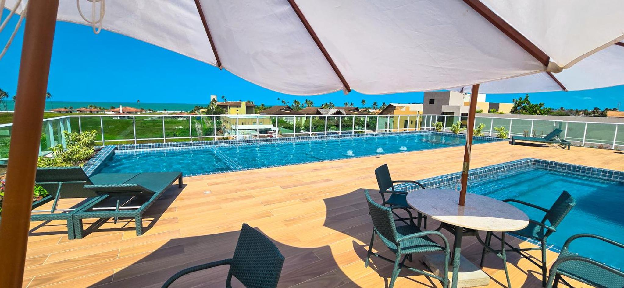 CG101- Flat Rooftop com piscina infinita e garagem- By Oasis Ferias