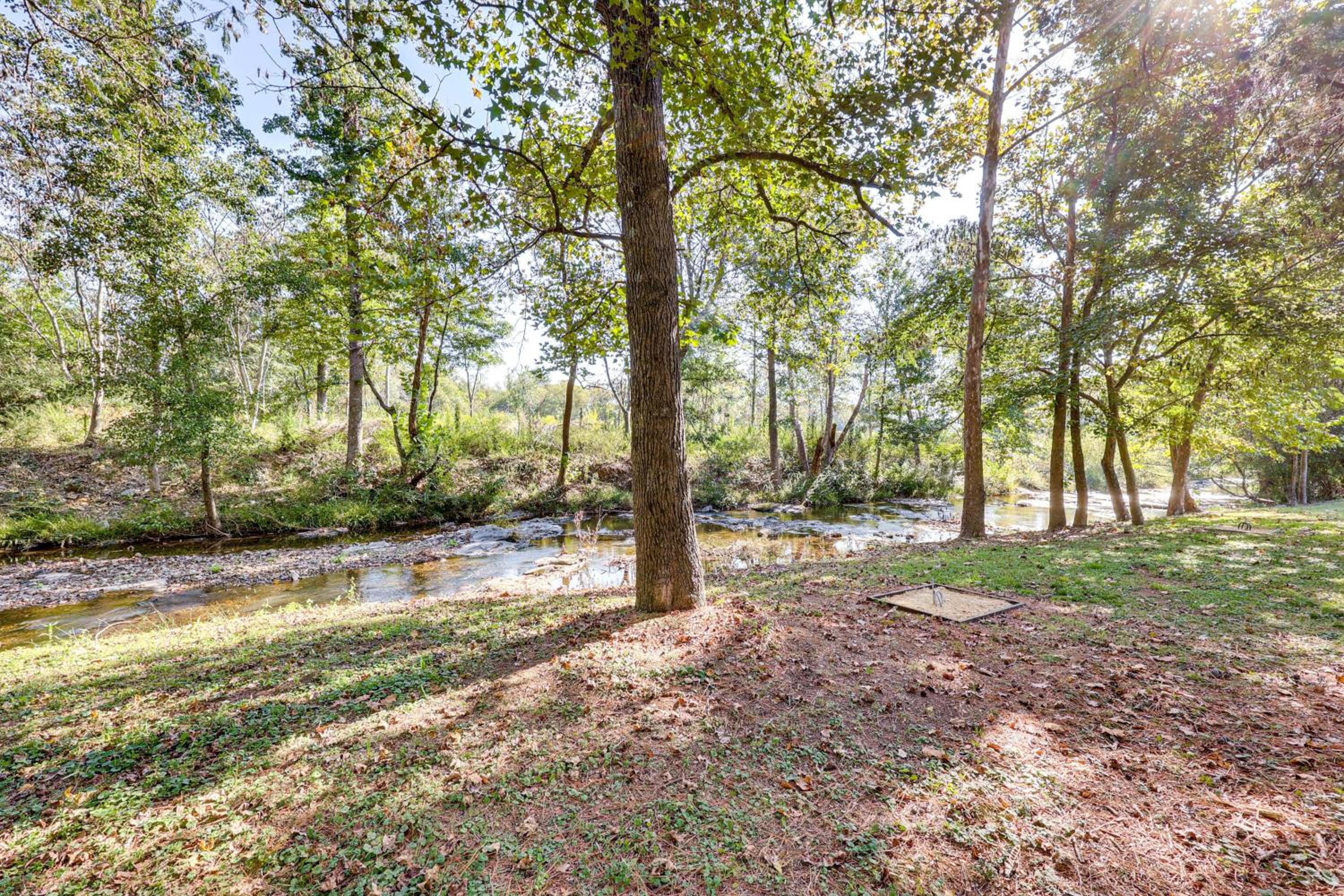 On-Site Creek and Spacious Yard Family Gem in Royal