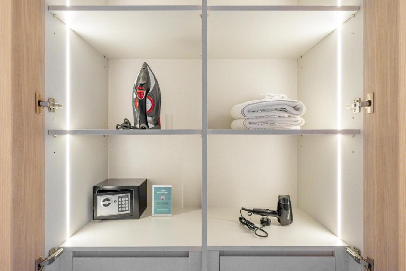 Stylish 1BR with PS5, Sauna and Kids' Play Area