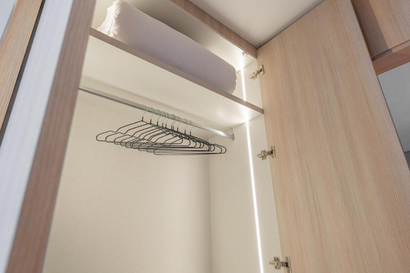 Stylish 1BR with PS5, Sauna and Kids' Play Area