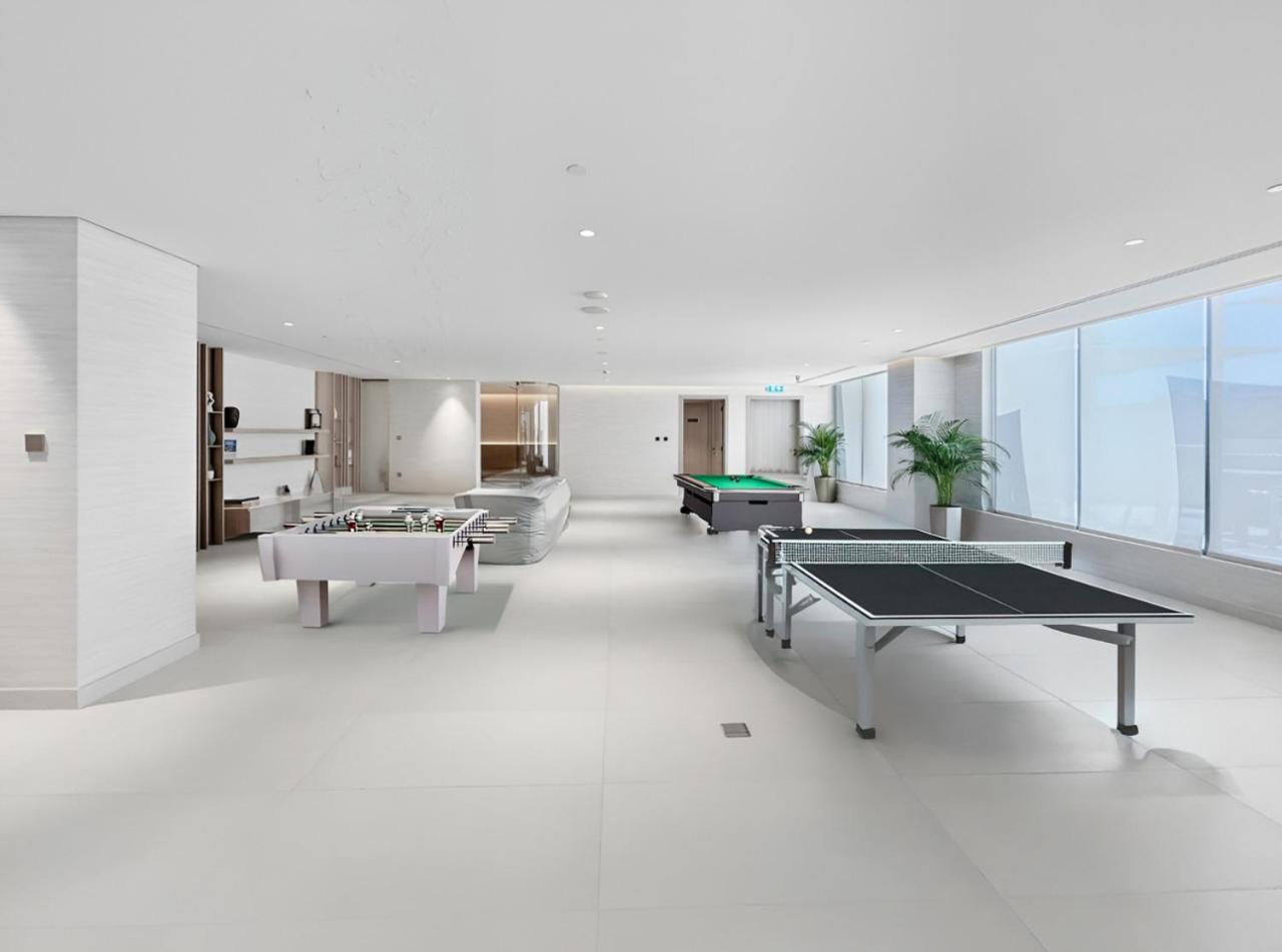 Stylish 1BR with PS5, Sauna and Kids' Play Area