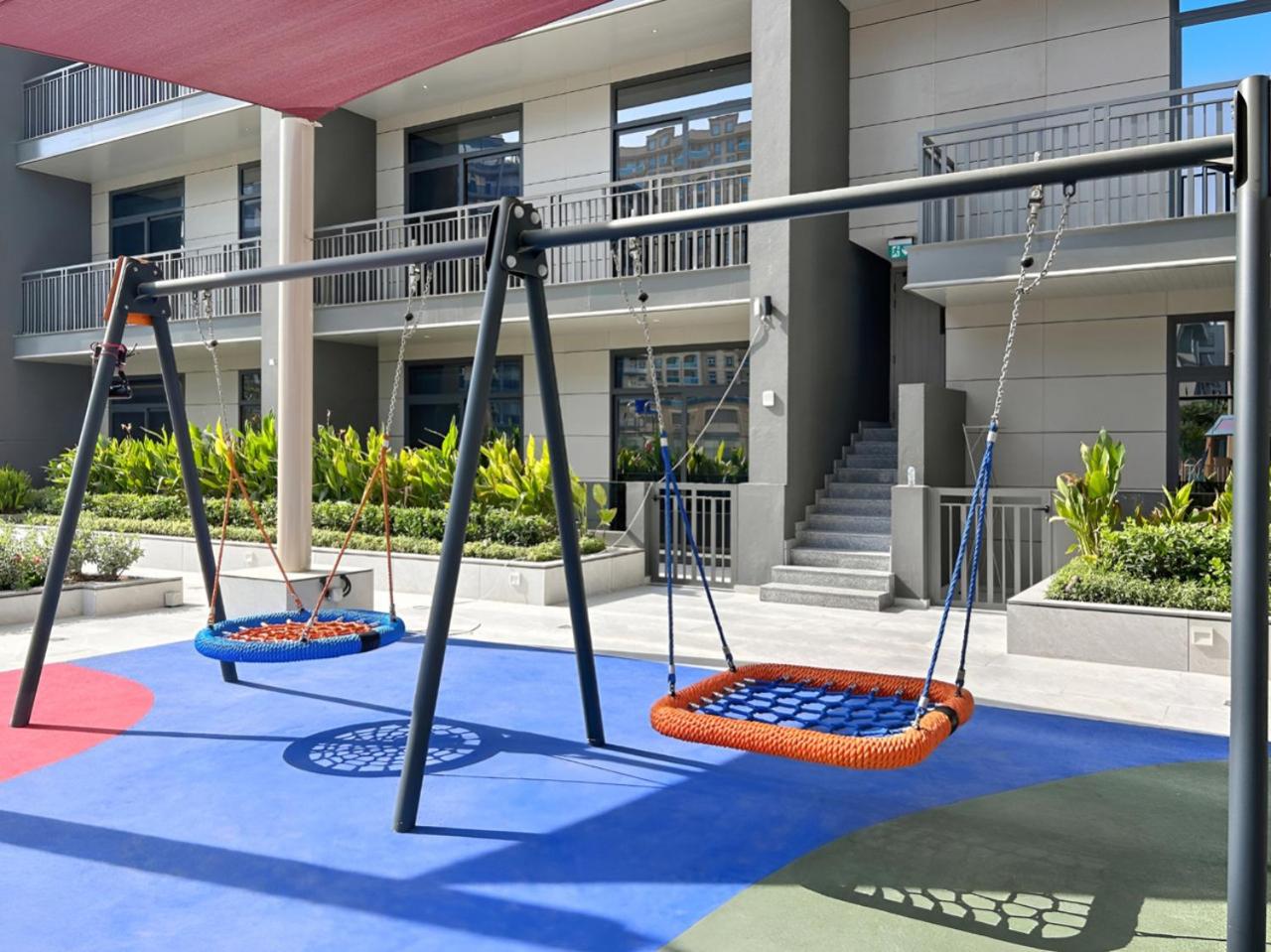 Stylish 1BR with PS5, Sauna and Kids' Play Area