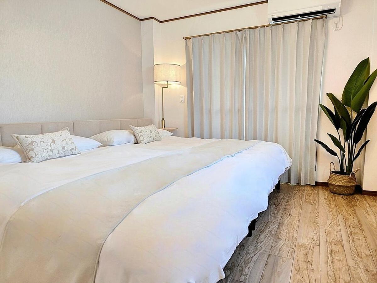 Luna Luxury 4BR Family Villa with Parking - 2 mins from Osaka-ko Station, near EXPO, USJ, Kaiyukan