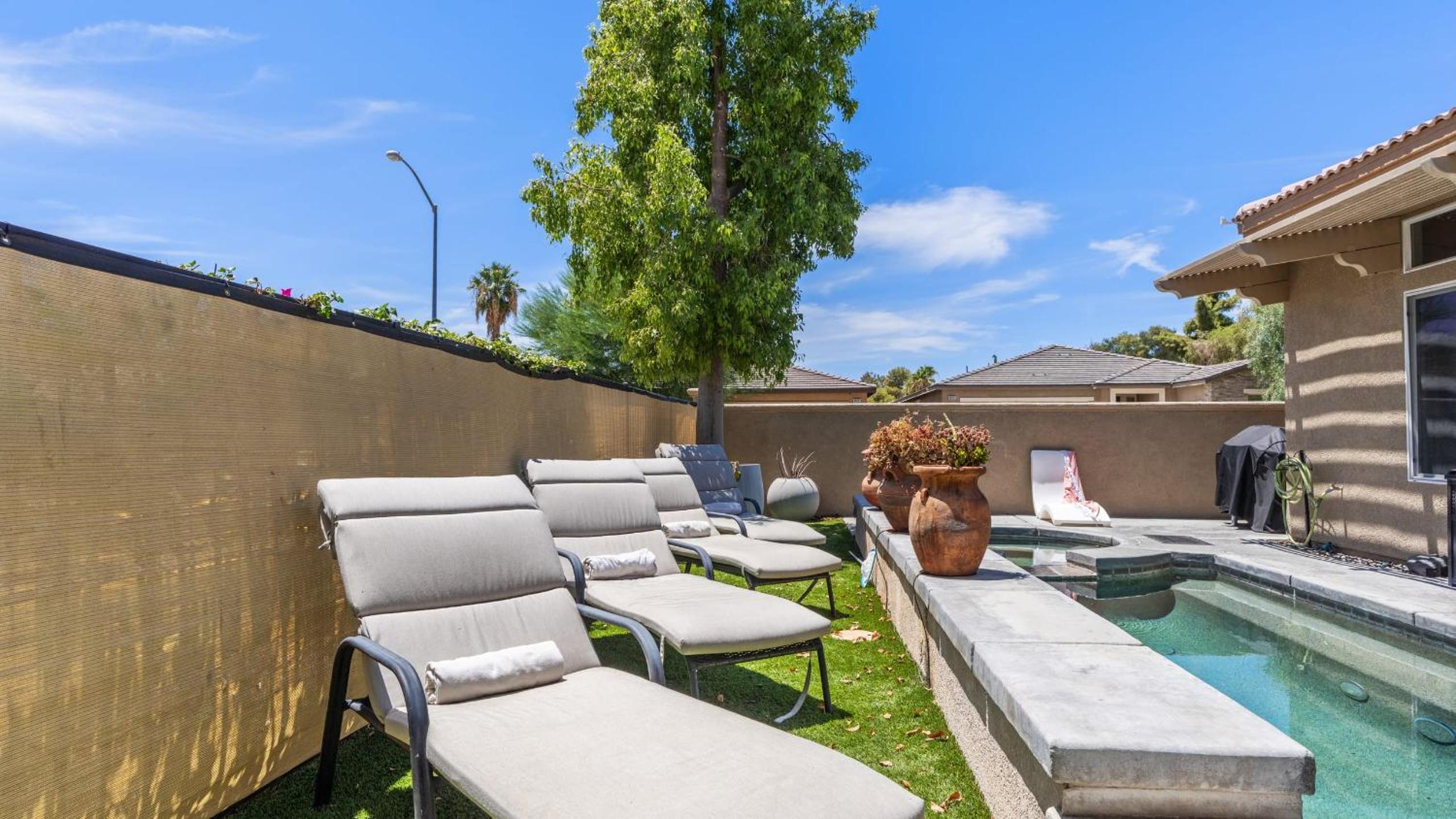 Designer Desert Oasis w Pool Hot Tub Outdoor Lounge The Riley by AvantStay