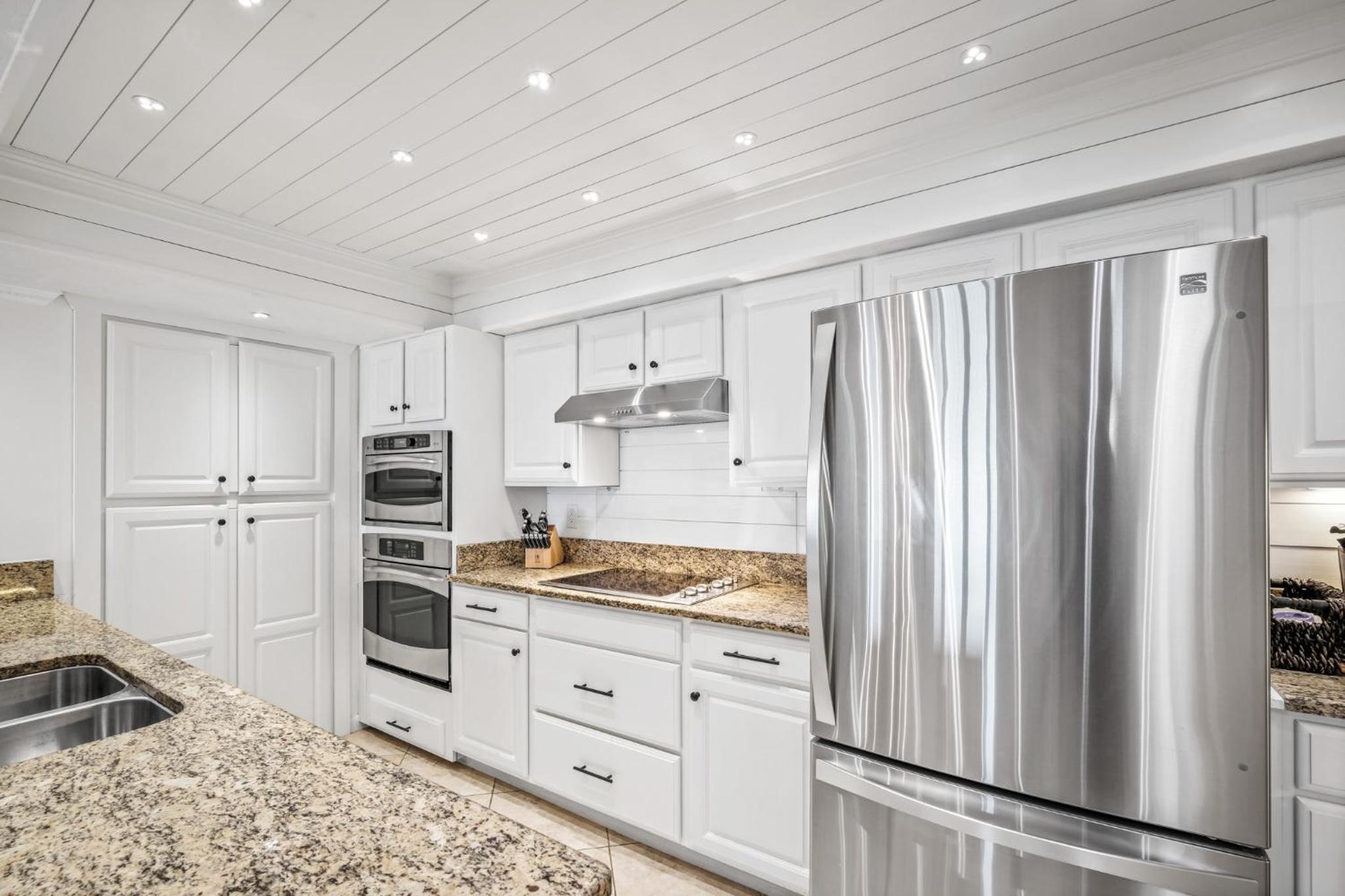 Luxury direct oceanfront corner penthouse with heated pool and garage parking
