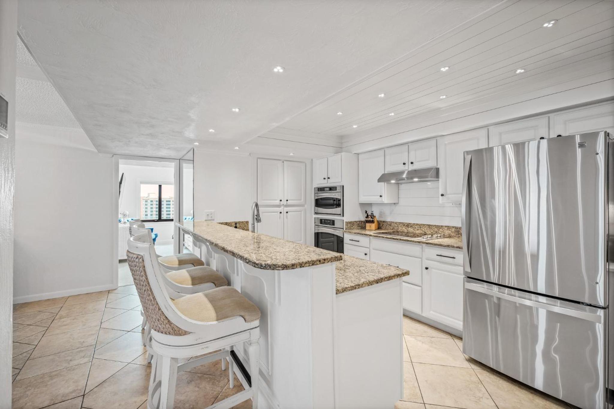 Luxury direct oceanfront corner penthouse with heated pool and garage parking