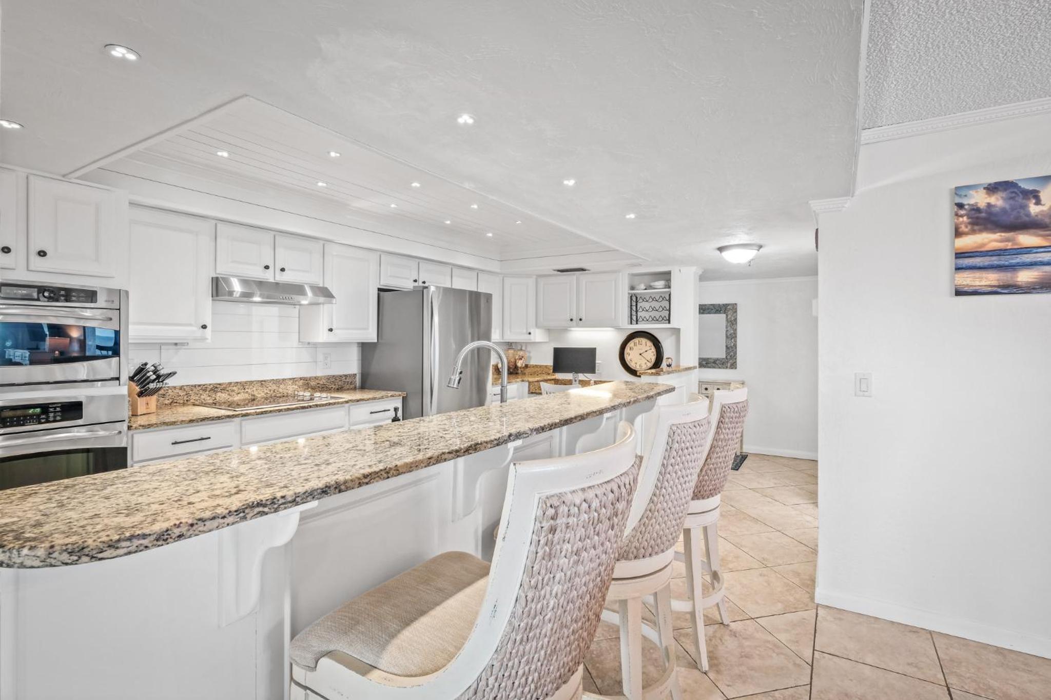 Luxury direct oceanfront corner penthouse with heated pool and garage parking