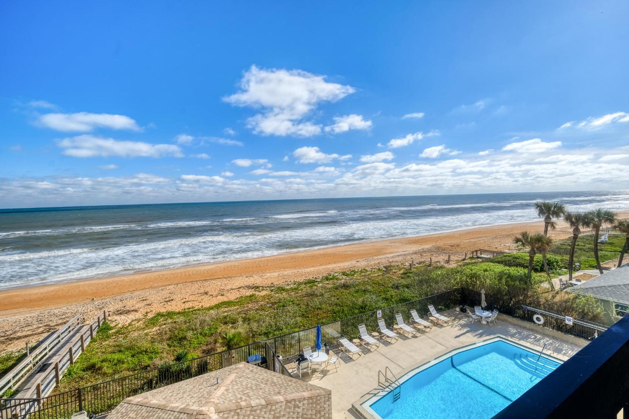 Luxury direct oceanfront corner with large private balcony, heated pool and garage